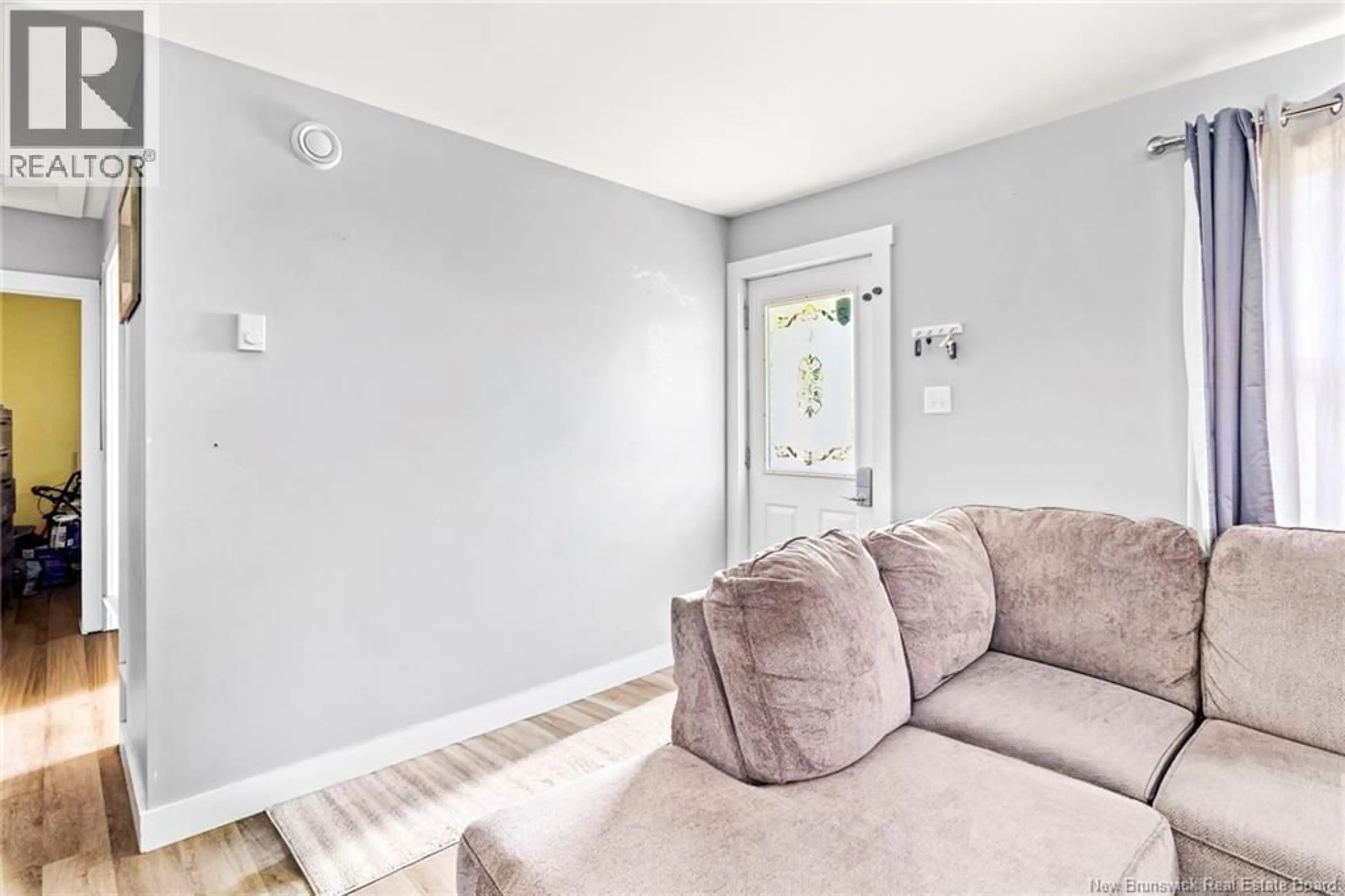 Living room with furniture, unknown for 210 MCNEILL AVENUE, Fredericton New Brunswick E3A1J6