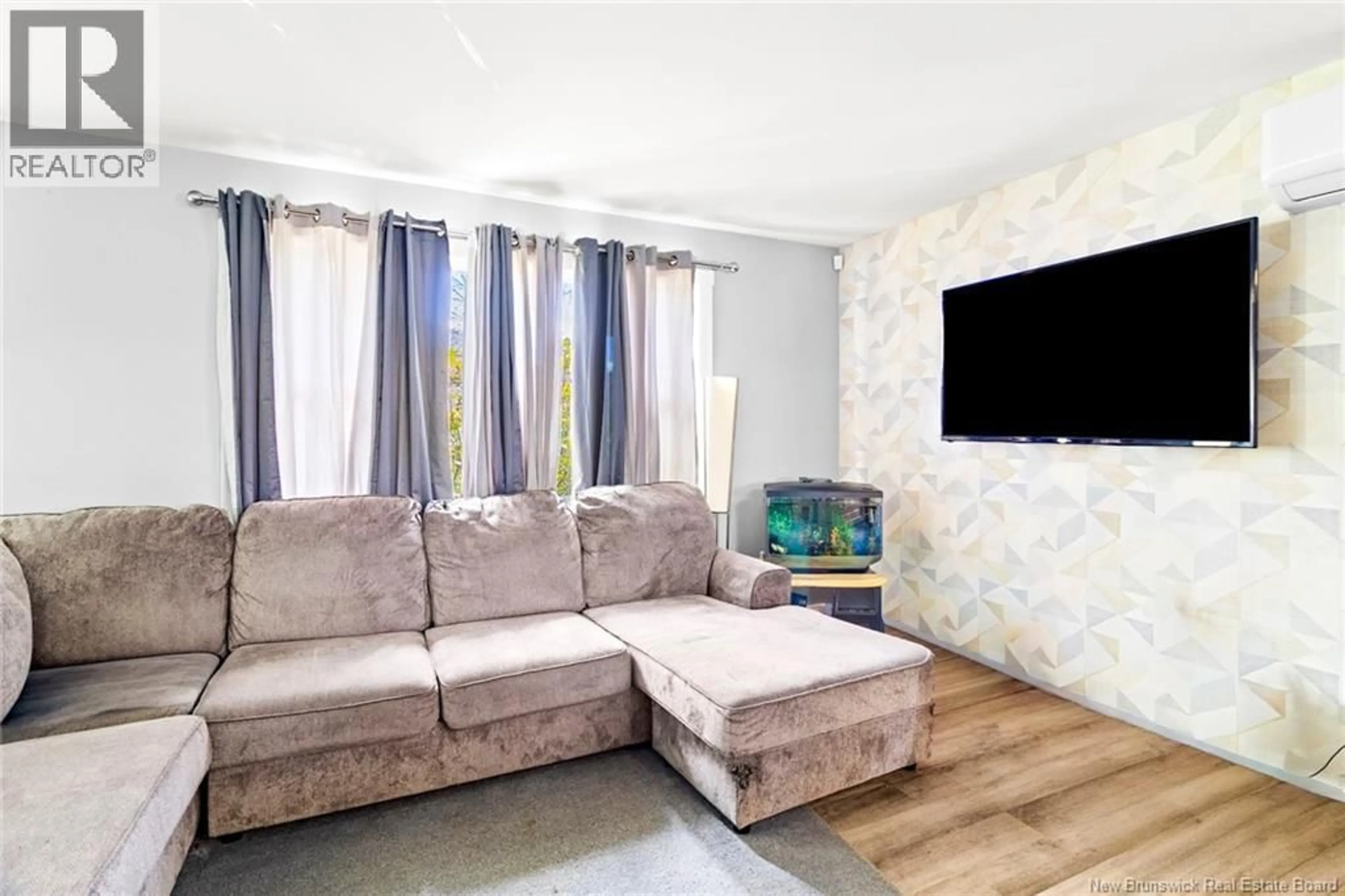 Living room with furniture, unknown for 210 MCNEILL AVENUE, Fredericton New Brunswick E3A1J6