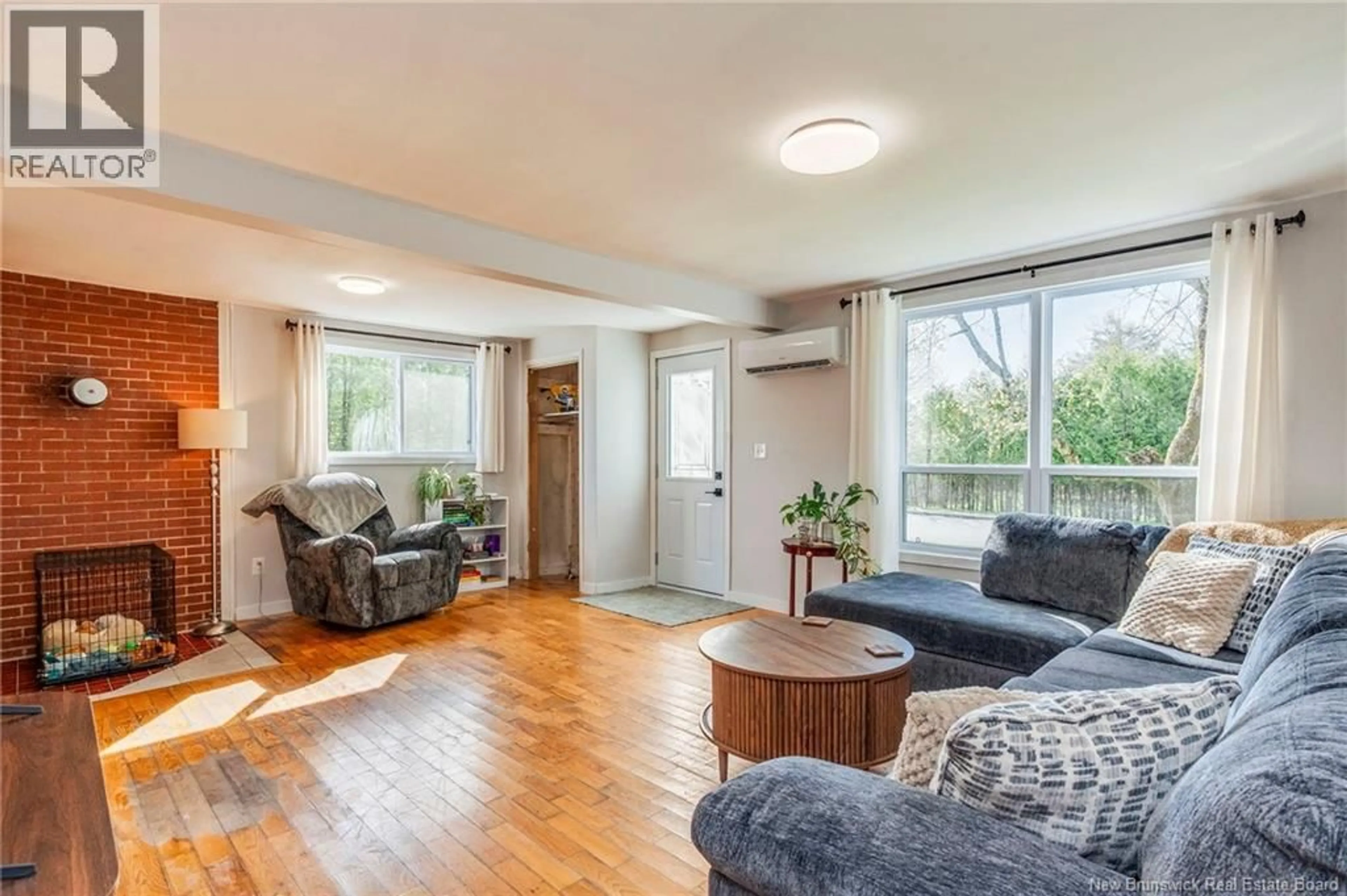 Living room with furniture, wood/laminate floor for 17 SUMMIT DRIVE, Saint John New Brunswick E2J3L6