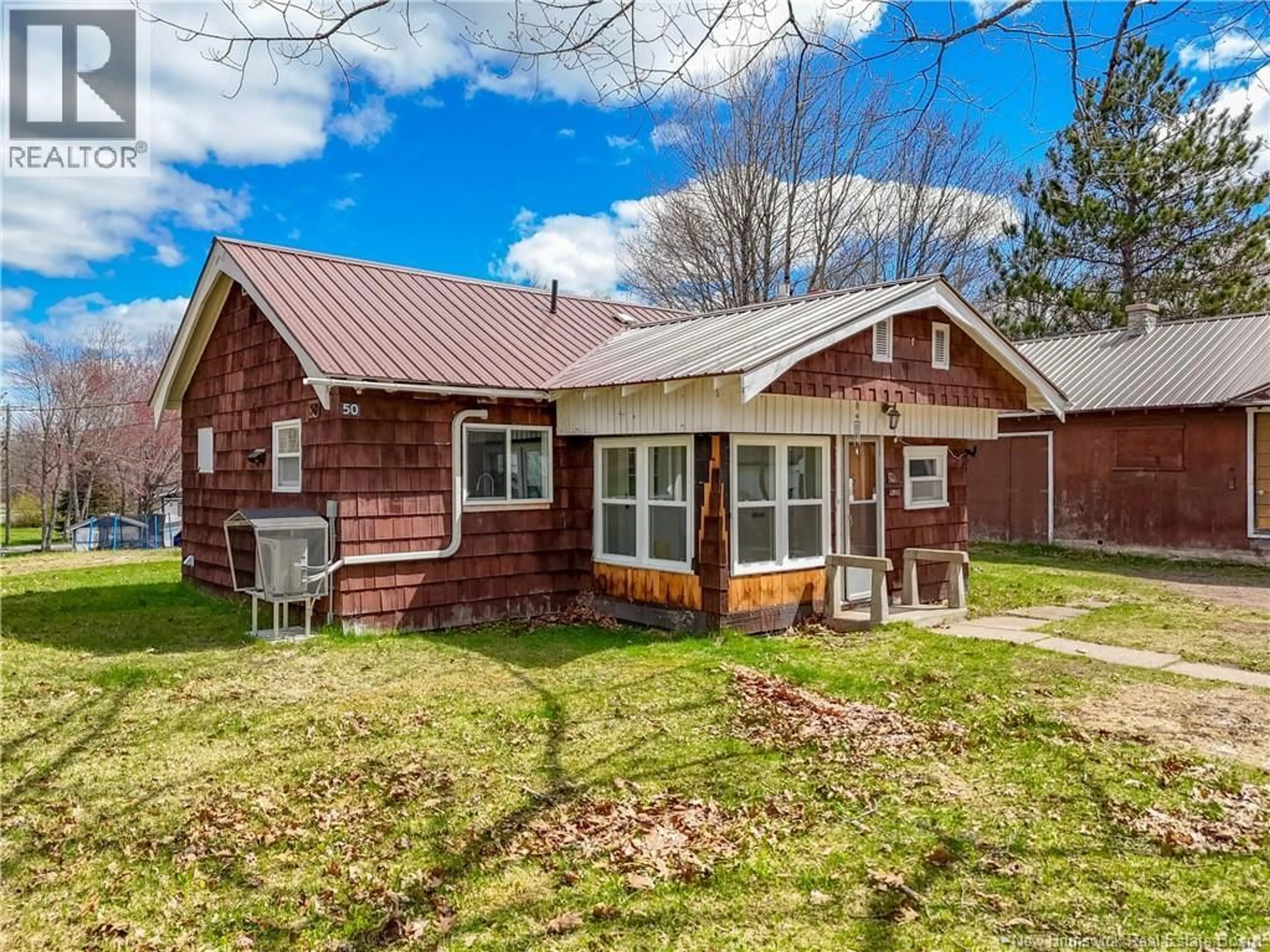 Home with vinyl exterior material, street for 50 WEST STREET, McAdam New Brunswick E6J1X4
