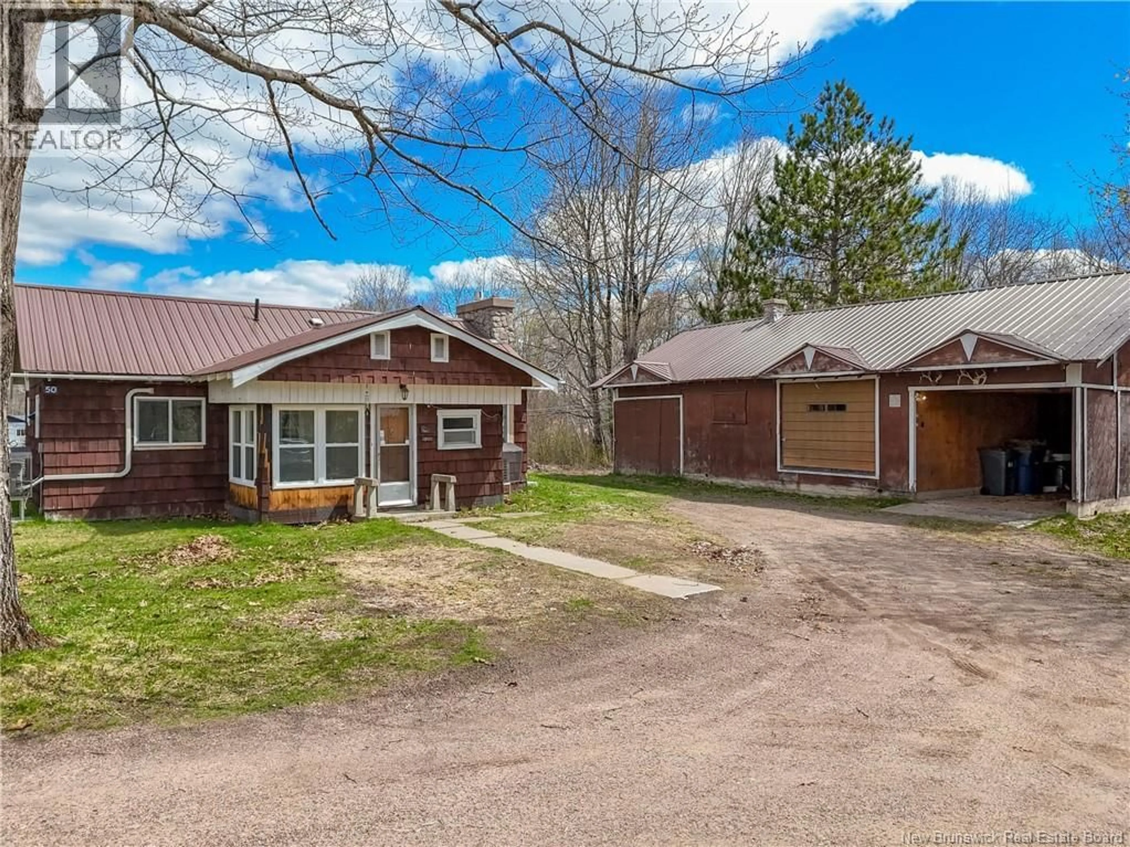A pic from outside/outdoor area/front of a property/back of a property/a pic from drone, unknown for 50 WEST STREET, McAdam New Brunswick E6J1X4