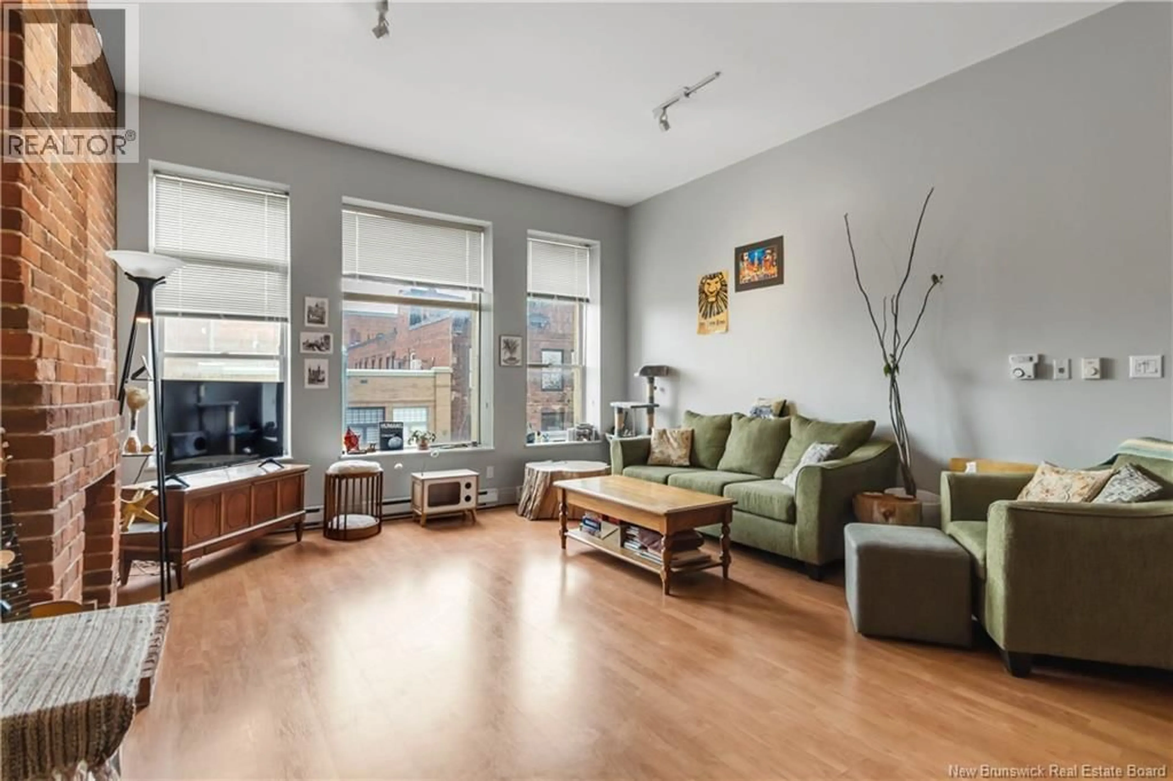 Living room with furniture, unknown for 302 - 850 MAIN STREET, Moncton New Brunswick E1C1G2