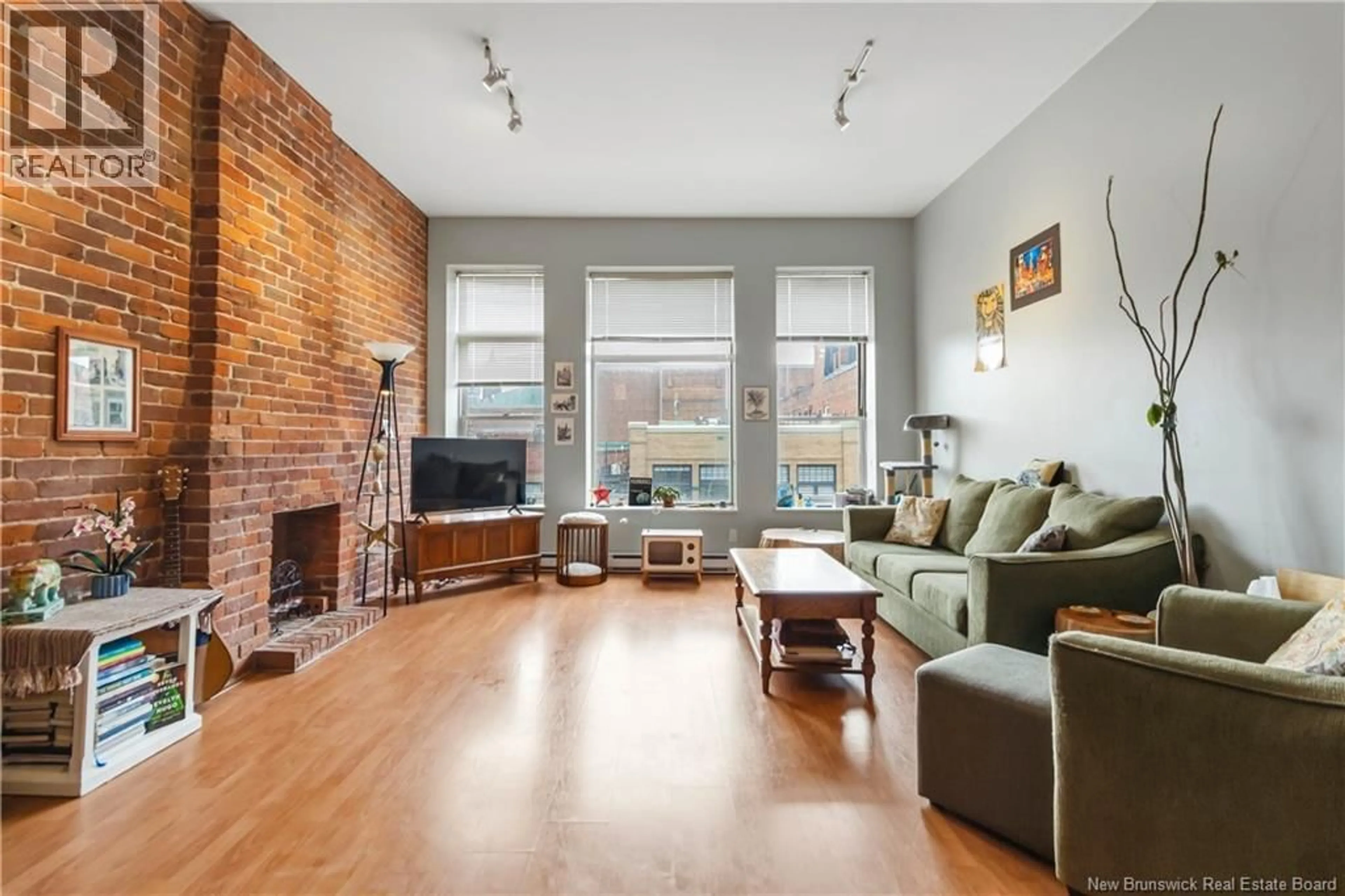 Living room with furniture, unknown for 302 - 850 MAIN STREET, Moncton New Brunswick E1C1G2