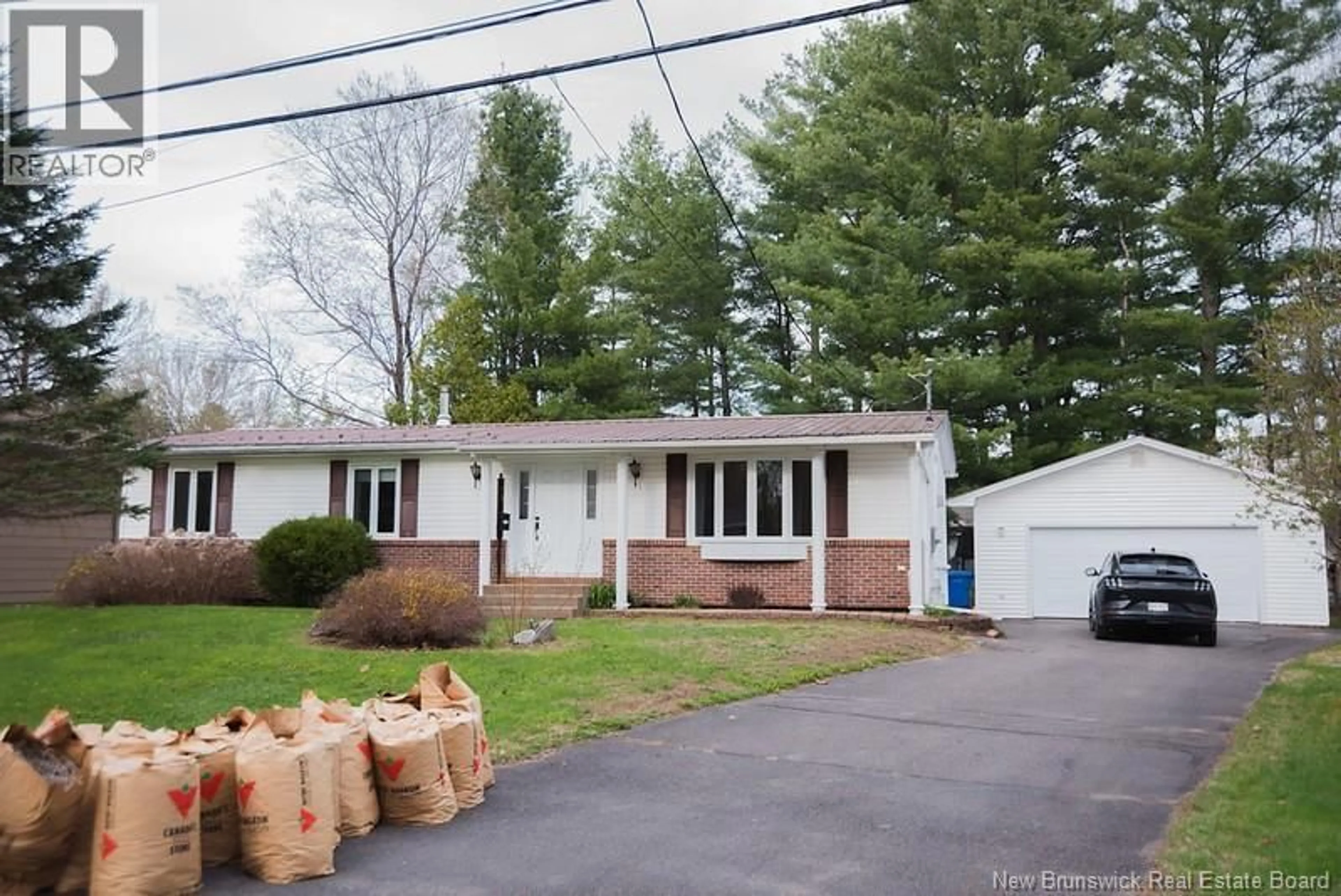 Home with vinyl exterior material, street for 72 HARTT STREET, Fredericton New Brunswick E3A4X8