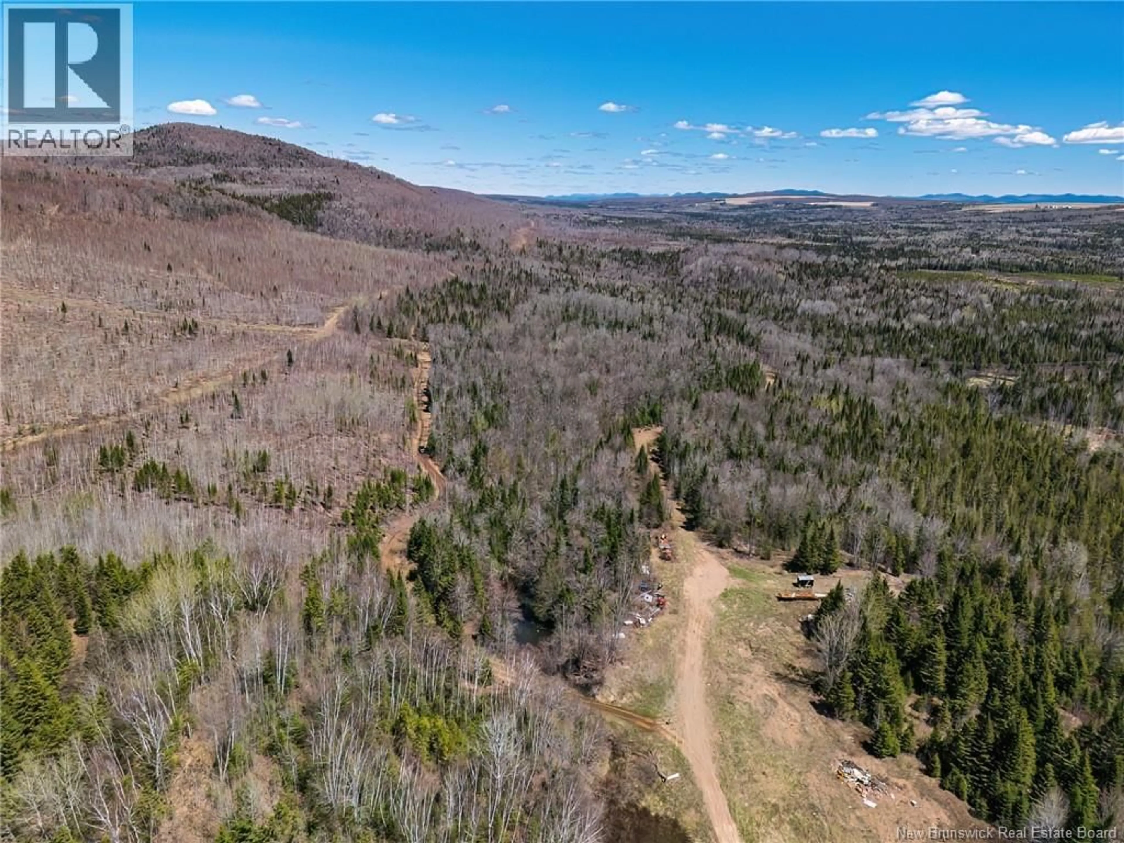 A pic from outside/outdoor area/front of a property/back of a property/a pic from drone, forest/trees view for 4124 ROUTE 108, Crombie Settlement New Brunswick E7G2R9