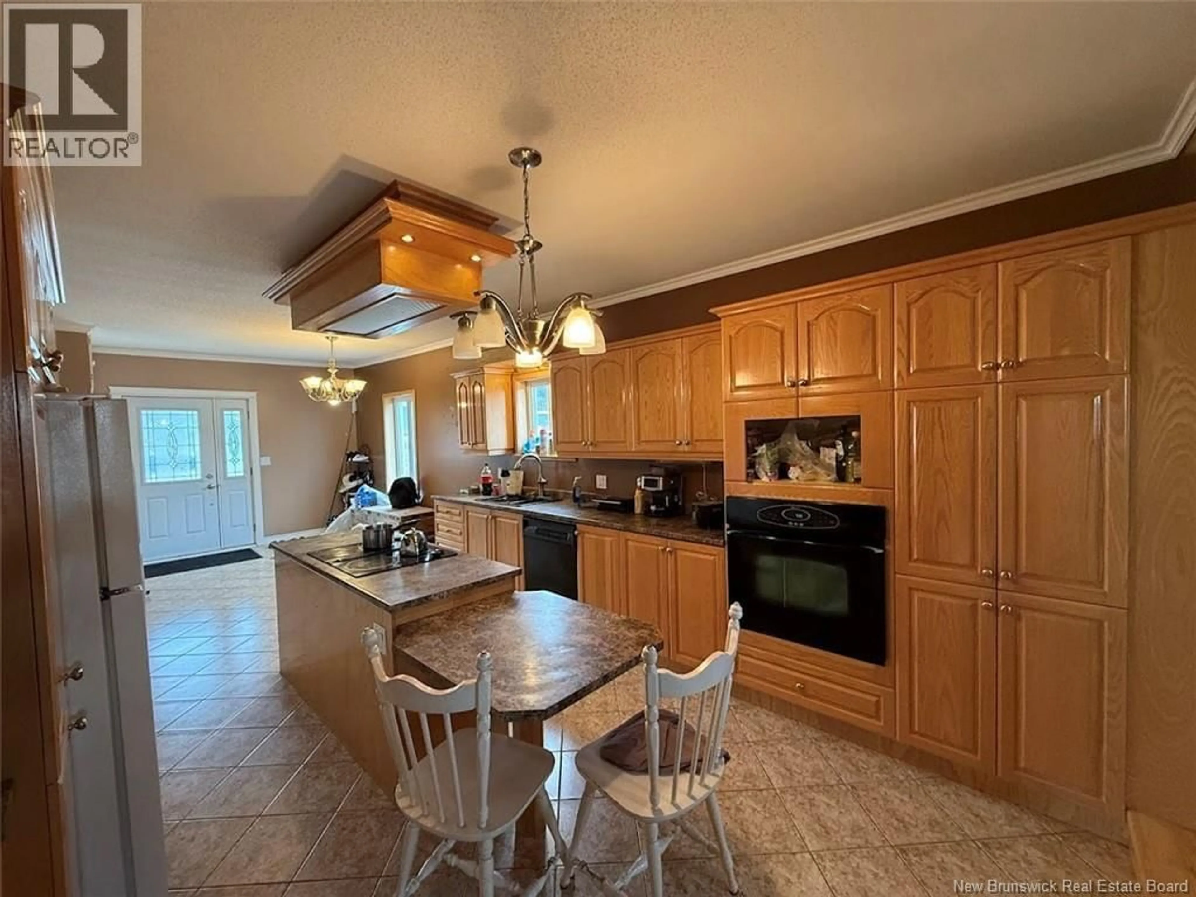 Open concept kitchen, ceramic/tile floor for 1156 ST-FRANCOIS STREET, Edmundston New Brunswick E3V4P8