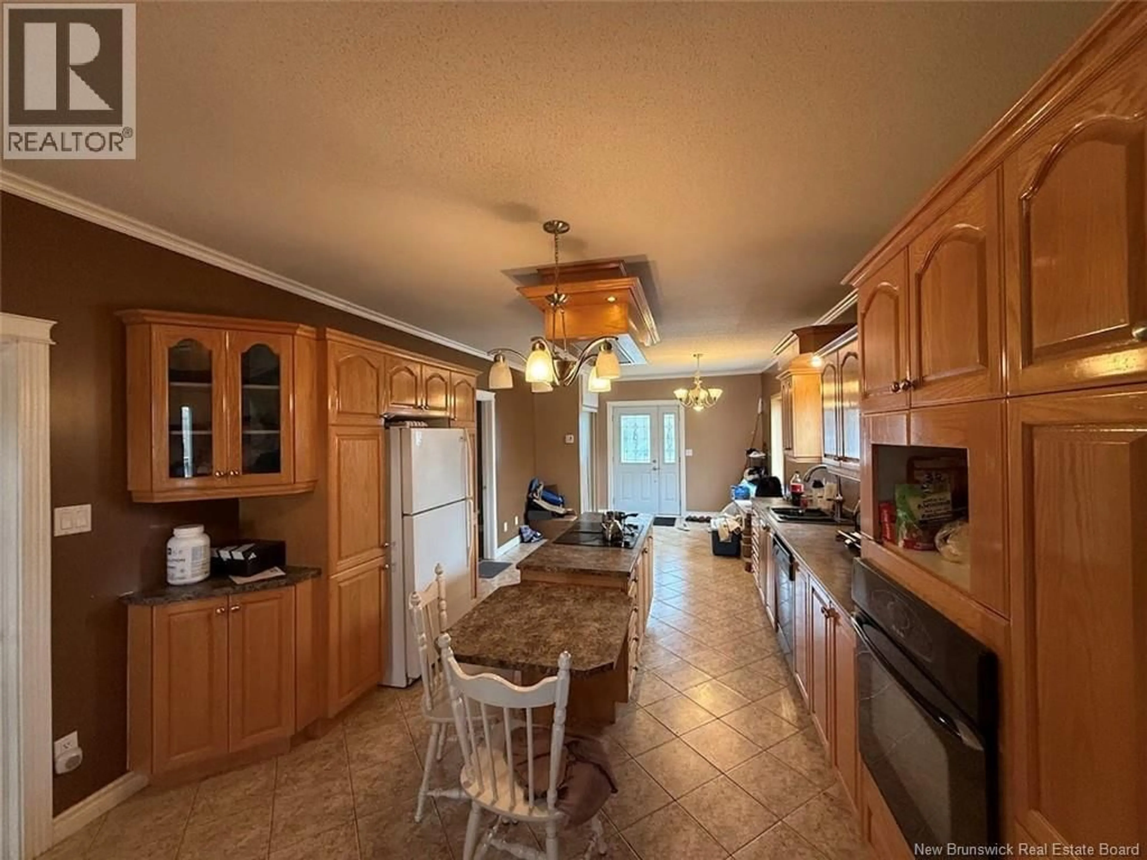 Open concept kitchen, ceramic/tile floor for 1156 ST-FRANCOIS STREET, Edmundston New Brunswick E3V4P8