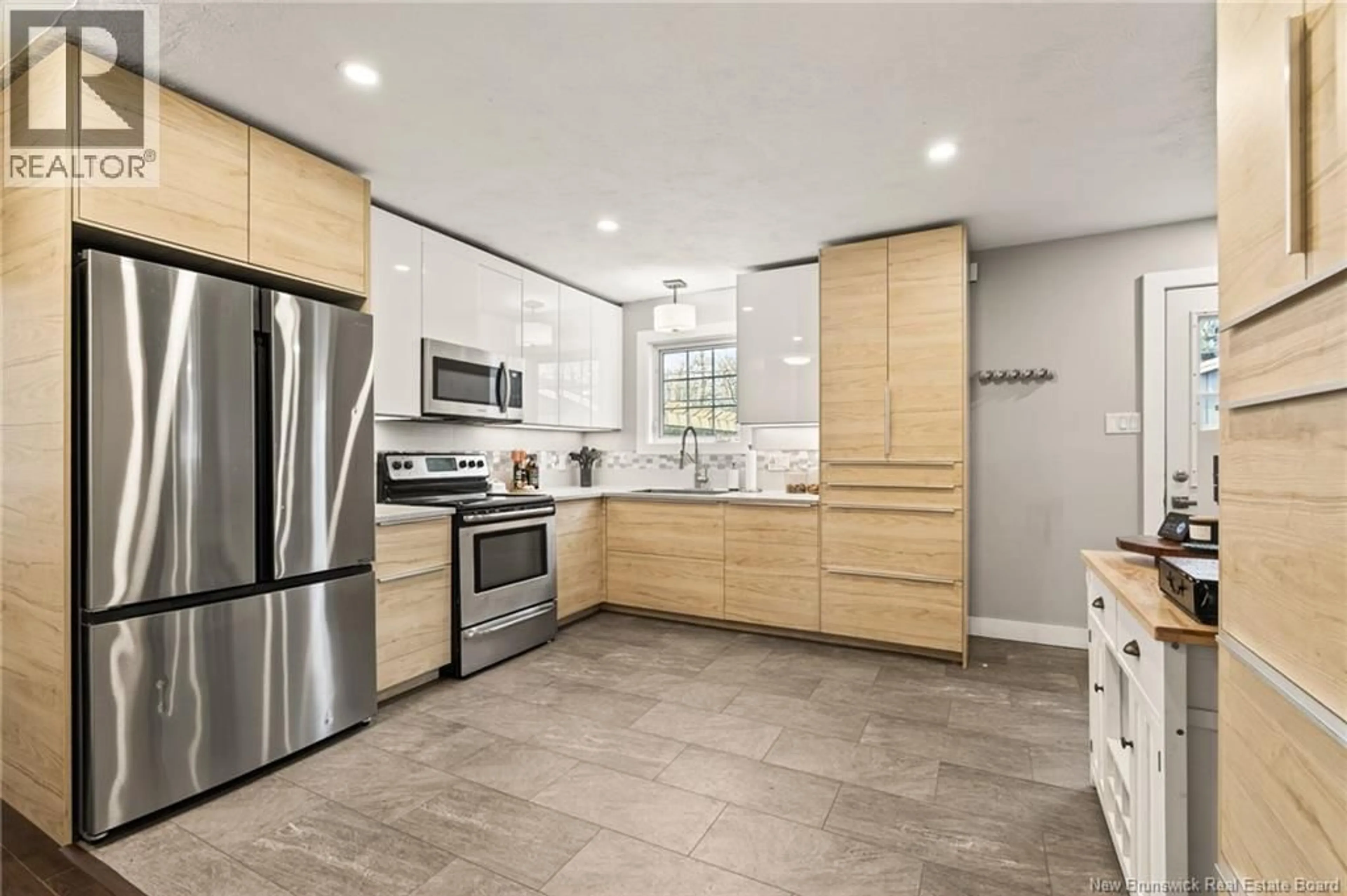 Open concept kitchen, ceramic/tile floor for 139 MAGELLAN, Moncton New Brunswick E1A5P3
