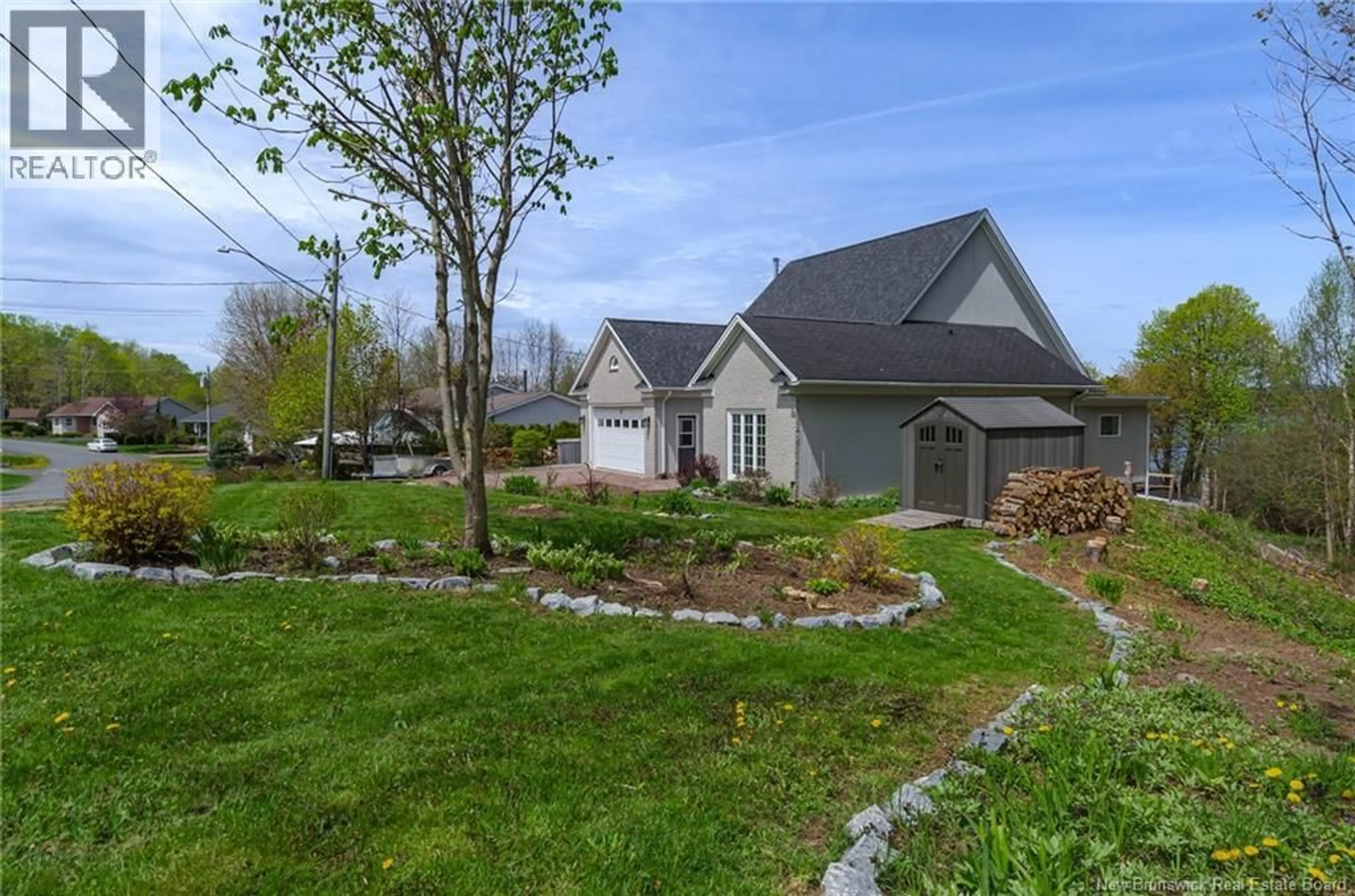 A pic from outside/outdoor area/front of a property/back of a property/a pic from drone, unknown for 27 SUNSET CRESCENT, Grand Bay-Westfield New Brunswick E5K2W3