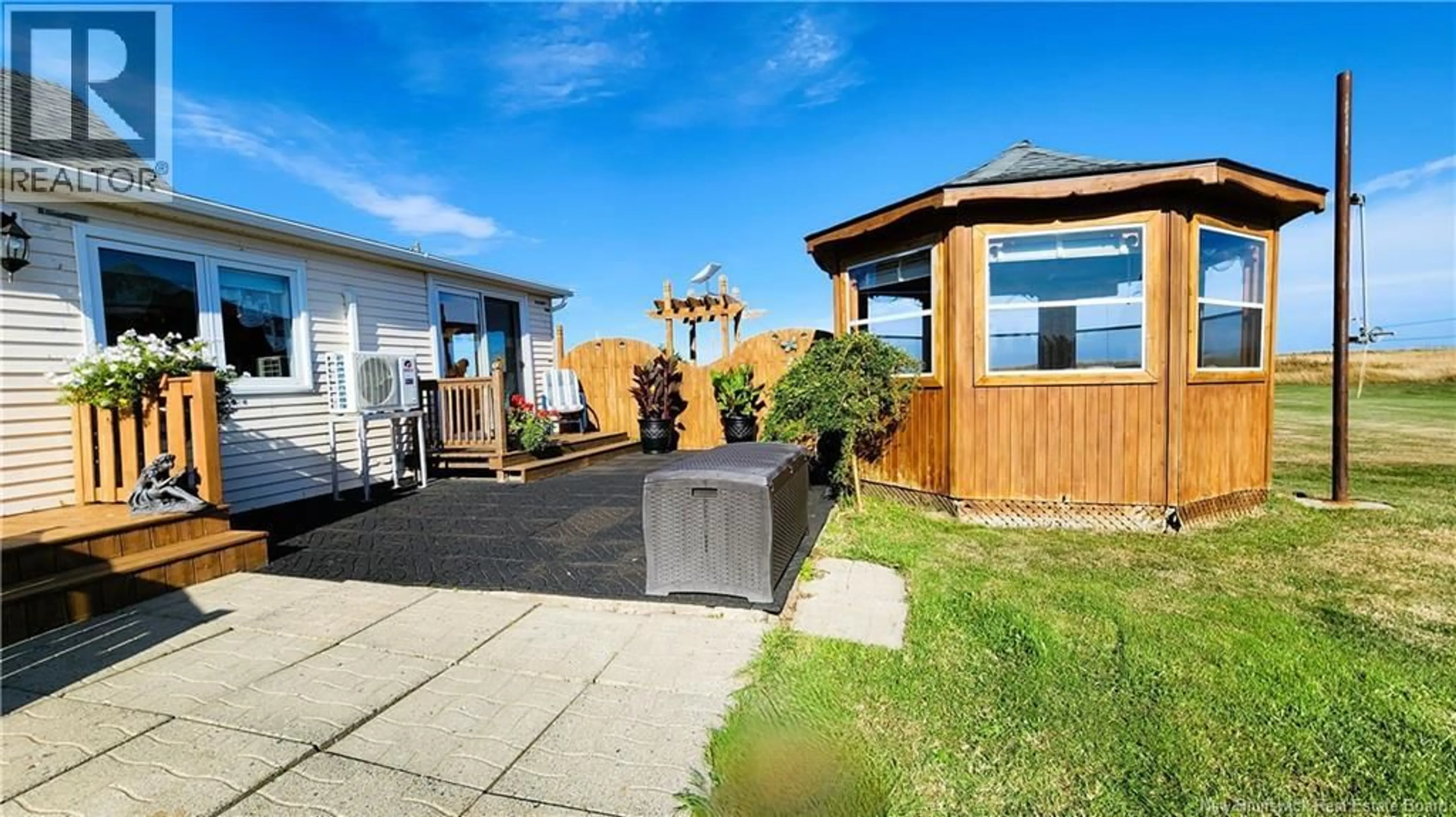A pic from outside/outdoor area/front of a property/back of a property/a pic from drone, street for 1645 CH. WILSON POINT, Miscou New Brunswick E8T2G8