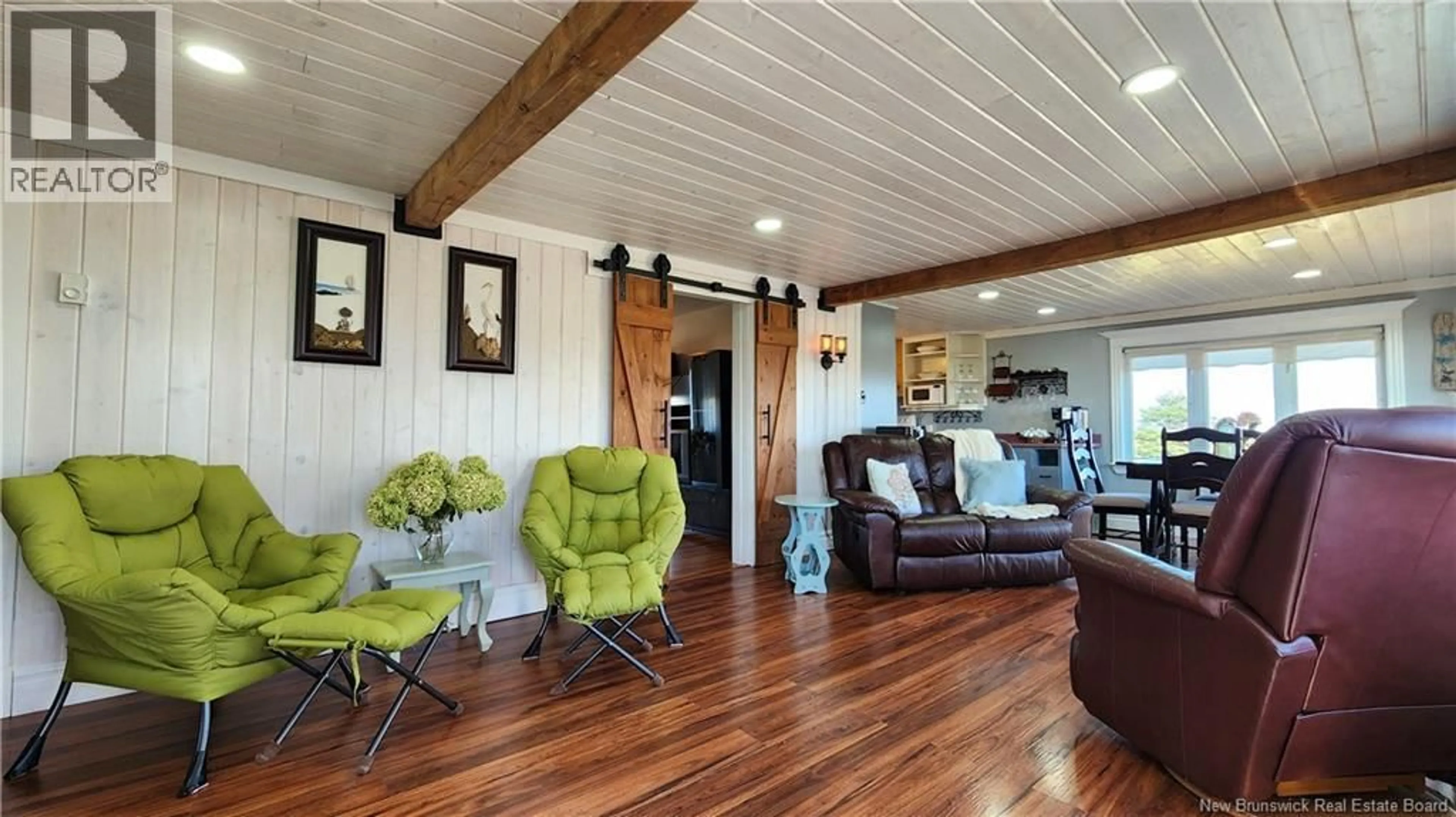 Living room with furniture, wood/laminate floor for 1645 CH. WILSON POINT, Miscou New Brunswick E8T2G8