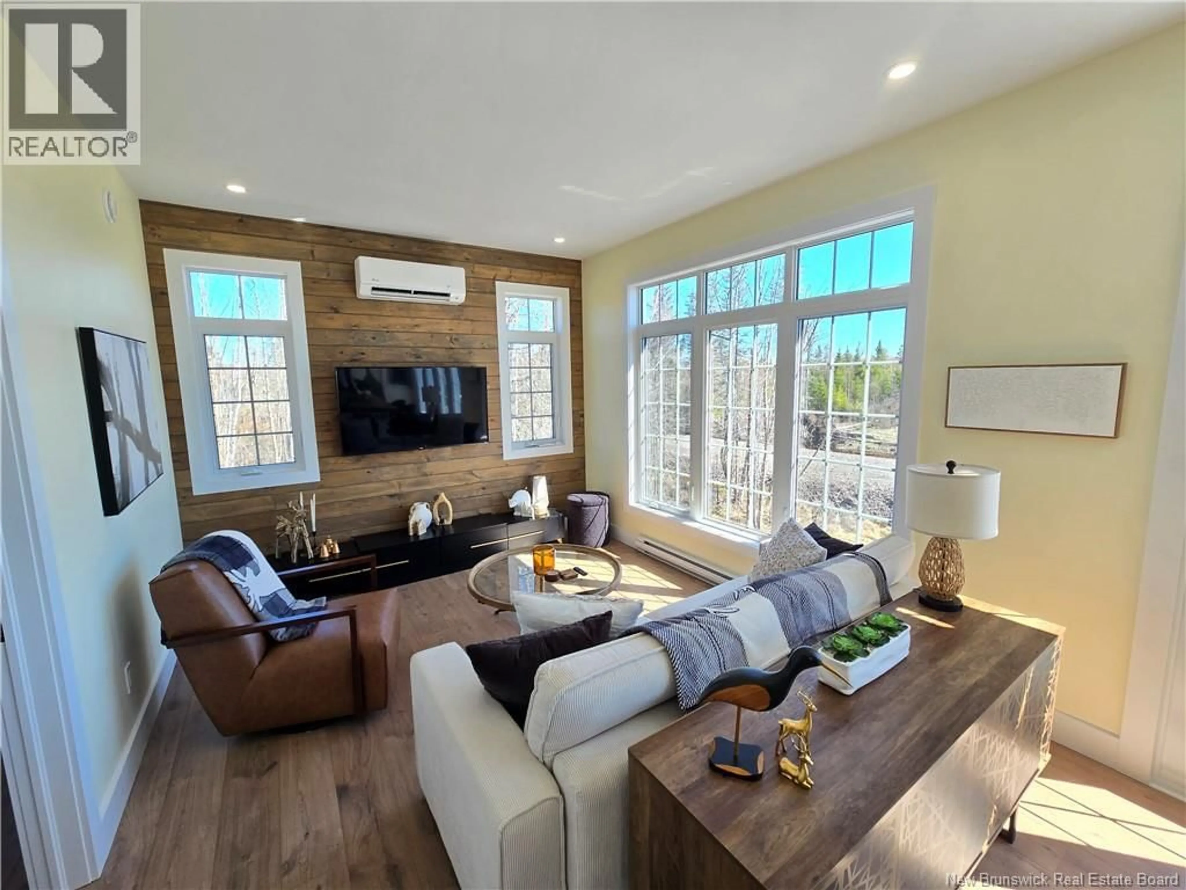 Living room with furniture, wood/laminate floor for 100 BELLA LANE, Nepisiguit Falls New Brunswick E2A6W7