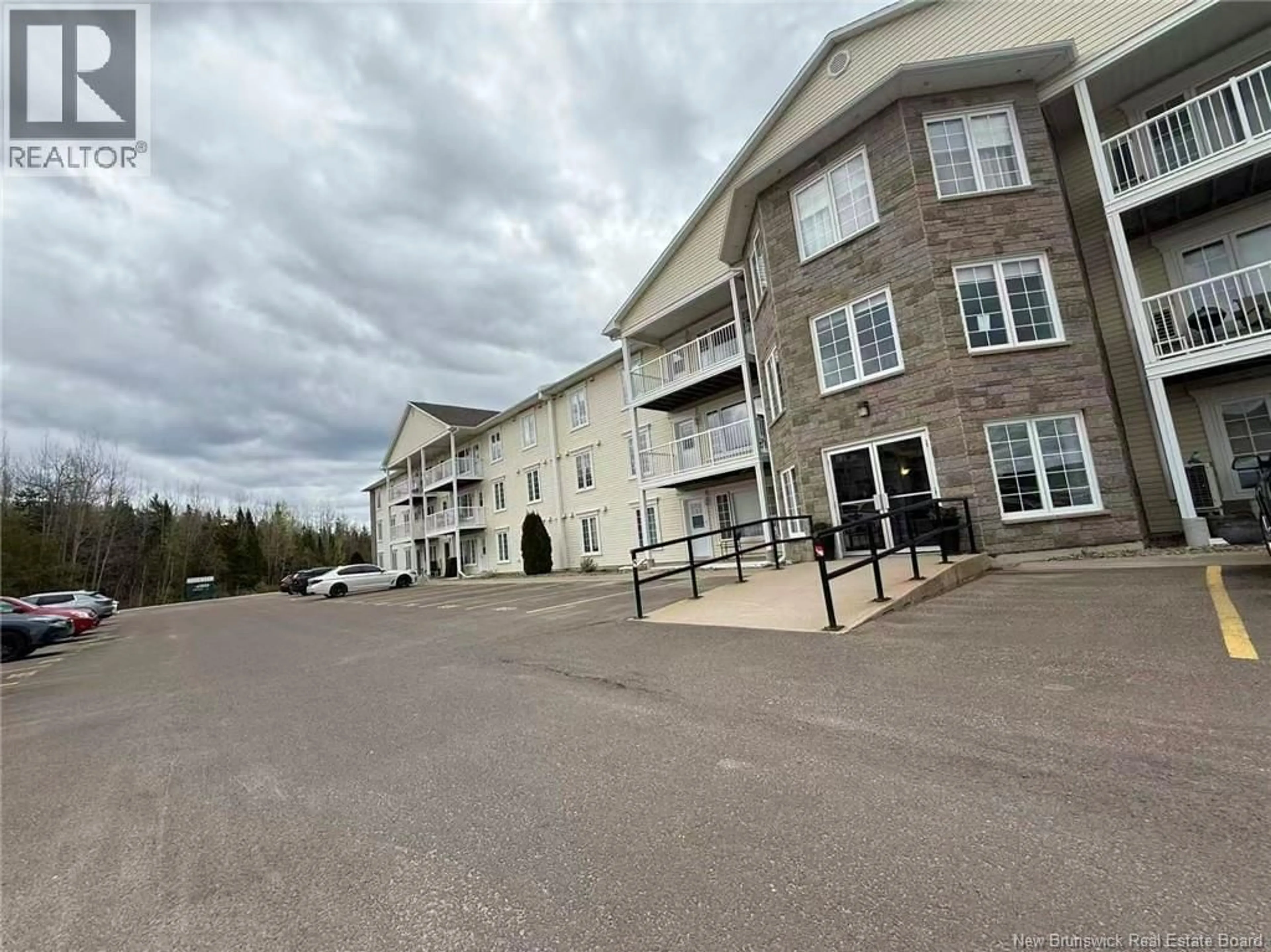 A pic from outside/outdoor area/front of a property/back of a property/a pic from drone, unknown for 223 - 130 LIAN STREET, Fredericton New Brunswick E3C0G4