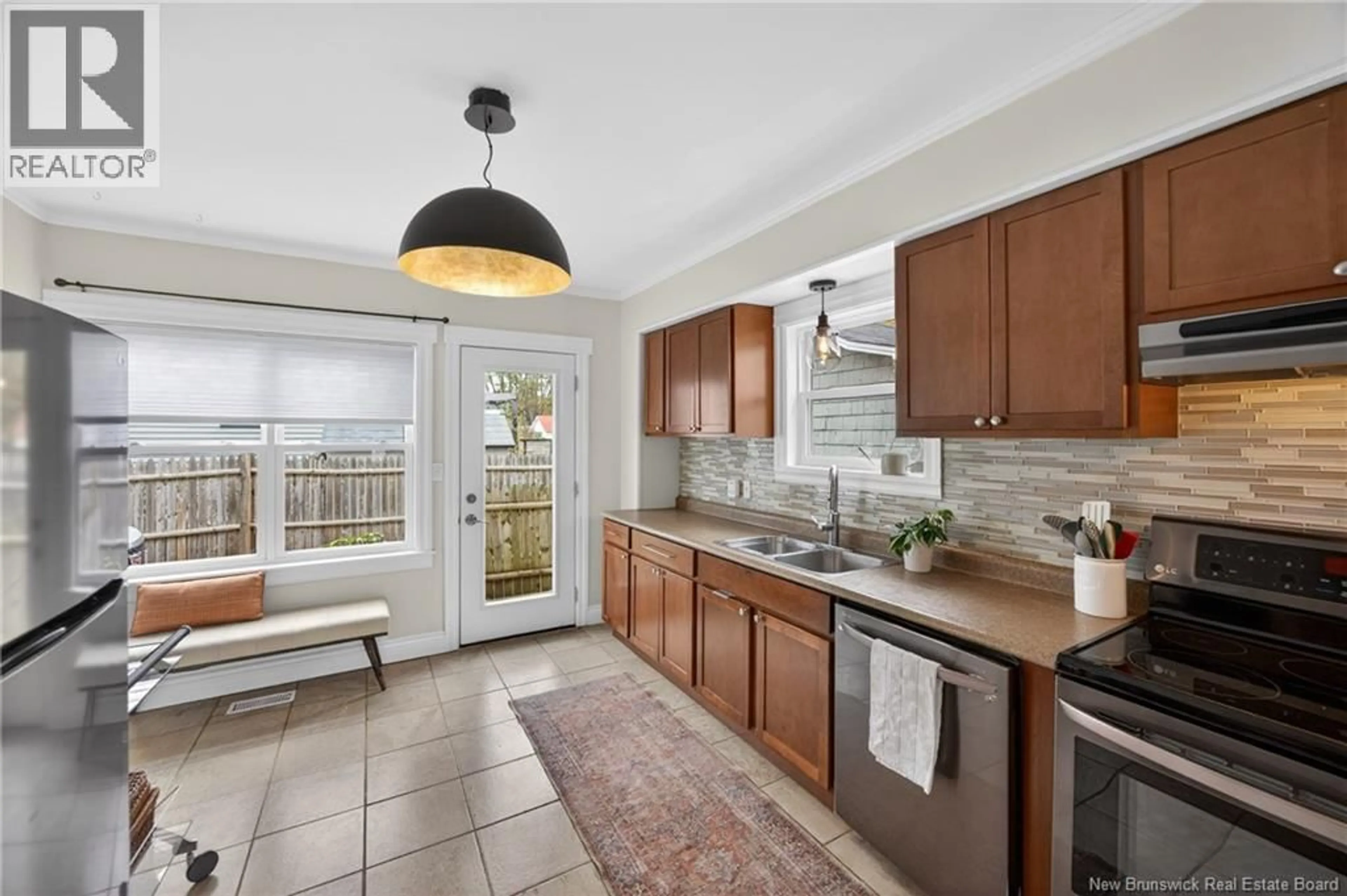 Open concept kitchen, ceramic/tile floor for 61 CHARLES AVENUE, Fredericton New Brunswick E3A3S3