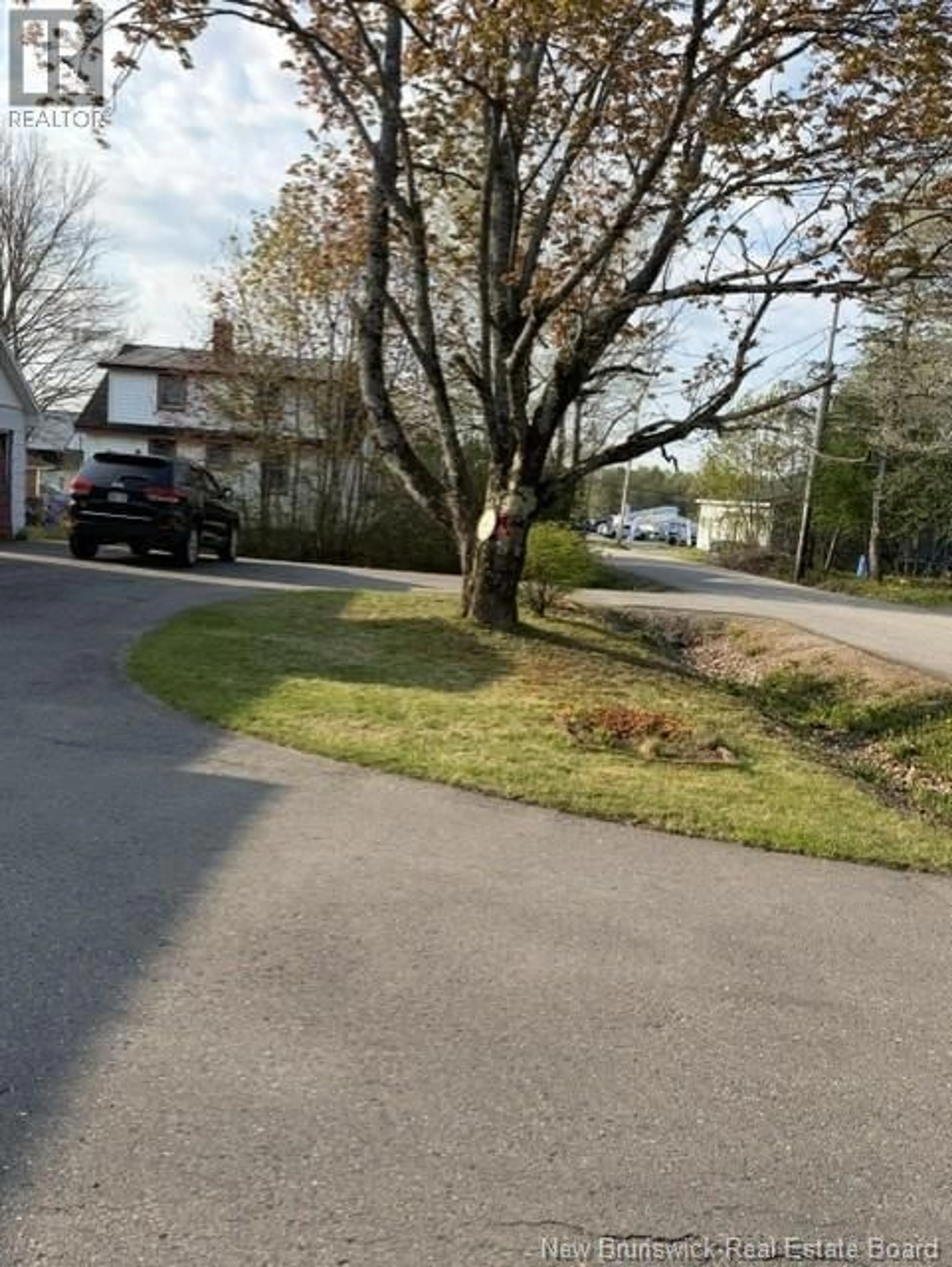 A pic from outside/outdoor area/front of a property/back of a property/a pic from drone, street for 10 HAPPY VALLEY LANE, St. Stephen New Brunswick E3L1P6
