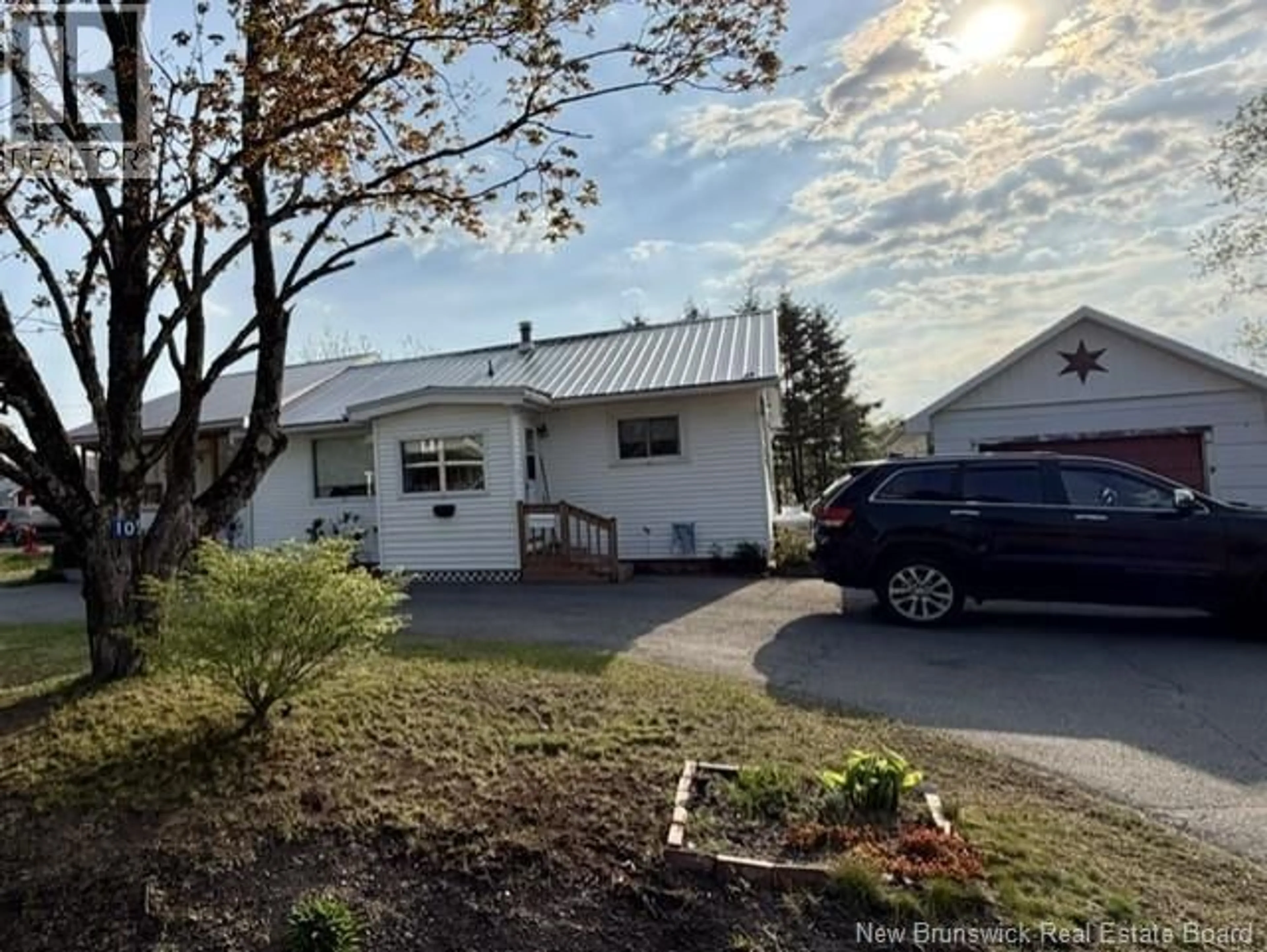 A pic from outside/outdoor area/front of a property/back of a property/a pic from drone, street for 10 HAPPY VALLEY LANE, St. Stephen New Brunswick E3L1P6