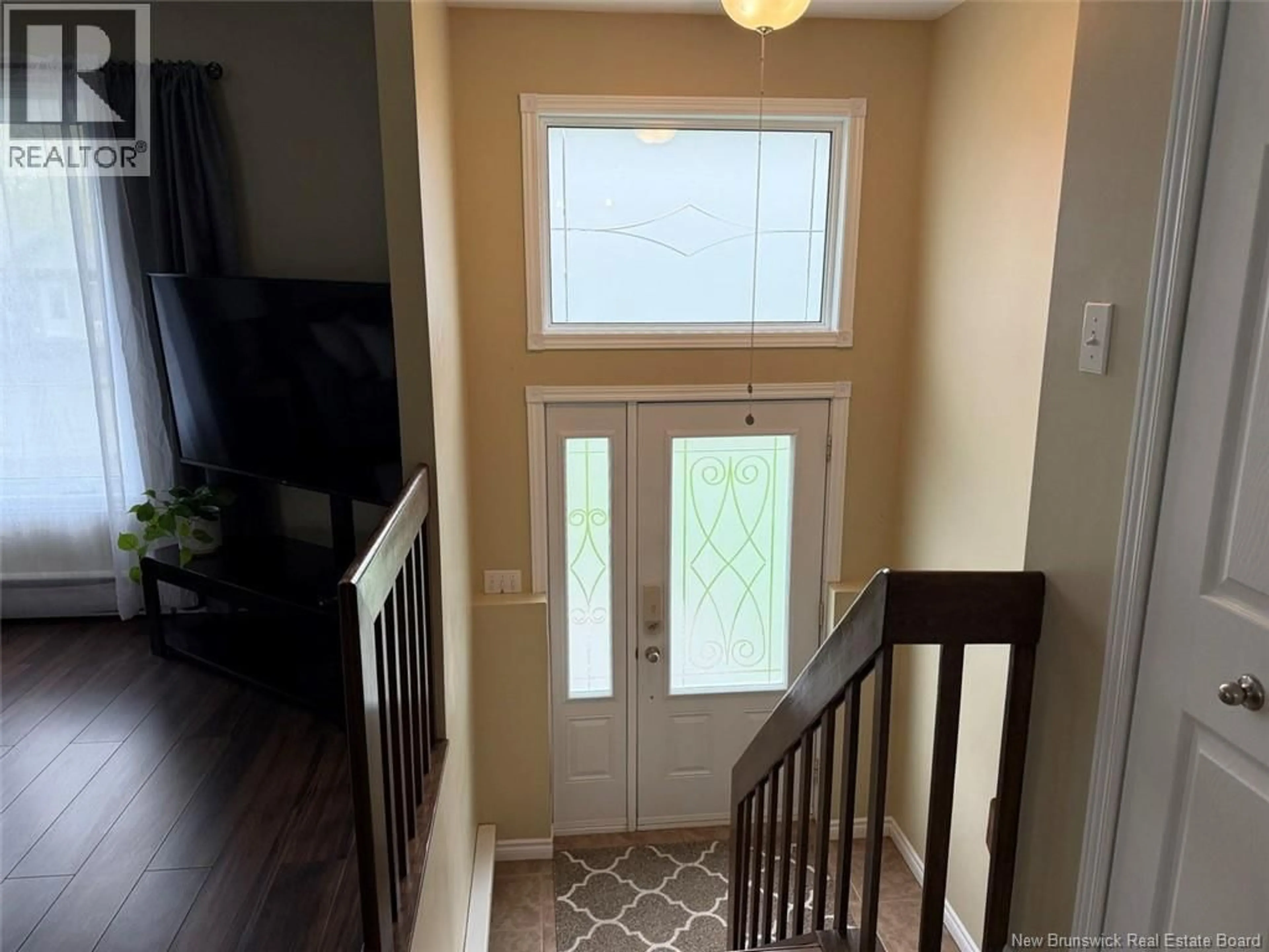 Indoor entryway for 27 MGR DIONNE AVENUE, Edmundston New Brunswick E3V4B2