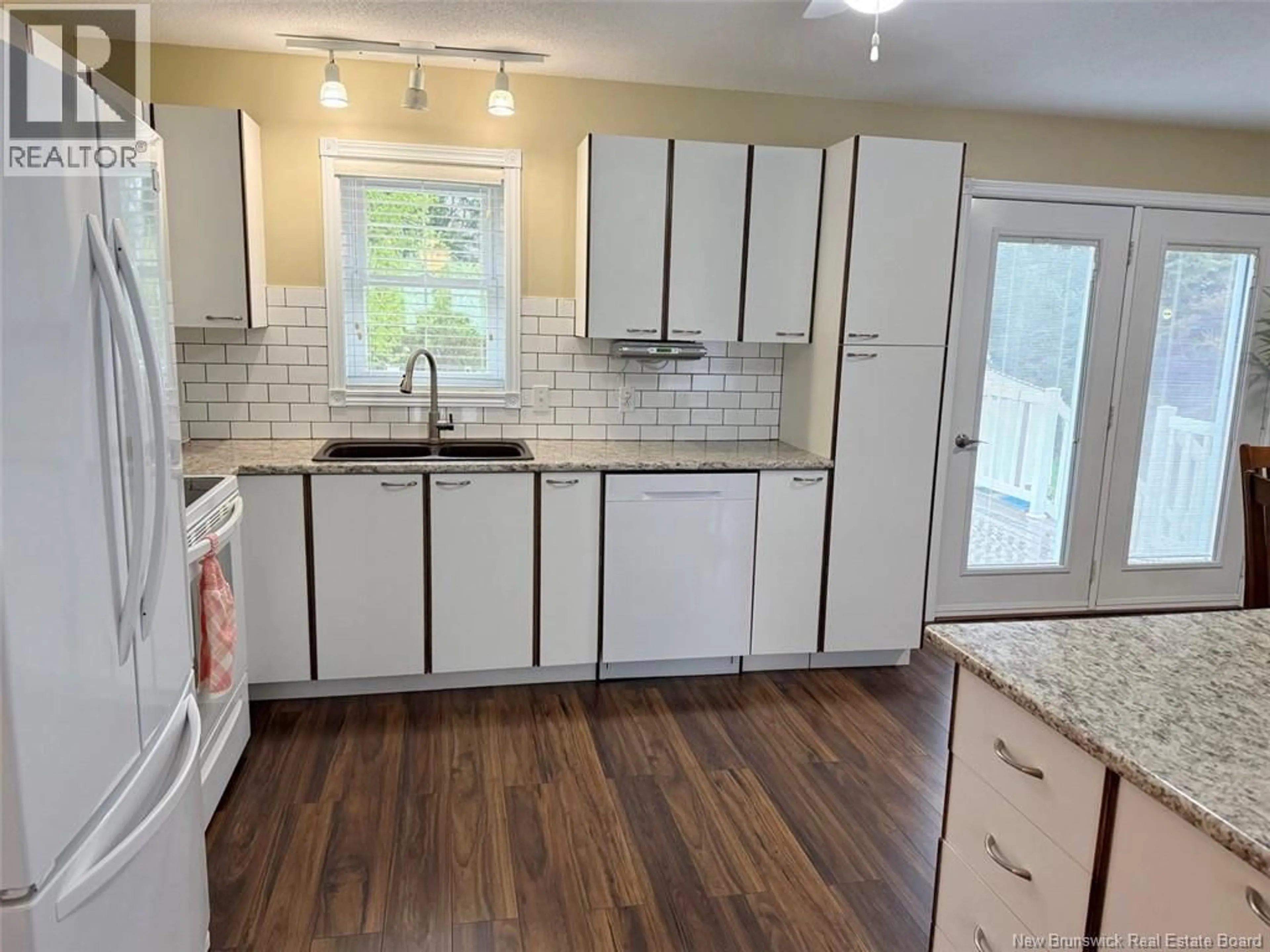 Open concept kitchen, unknown for 27 MGR DIONNE AVENUE, Edmundston New Brunswick E3V4B2
