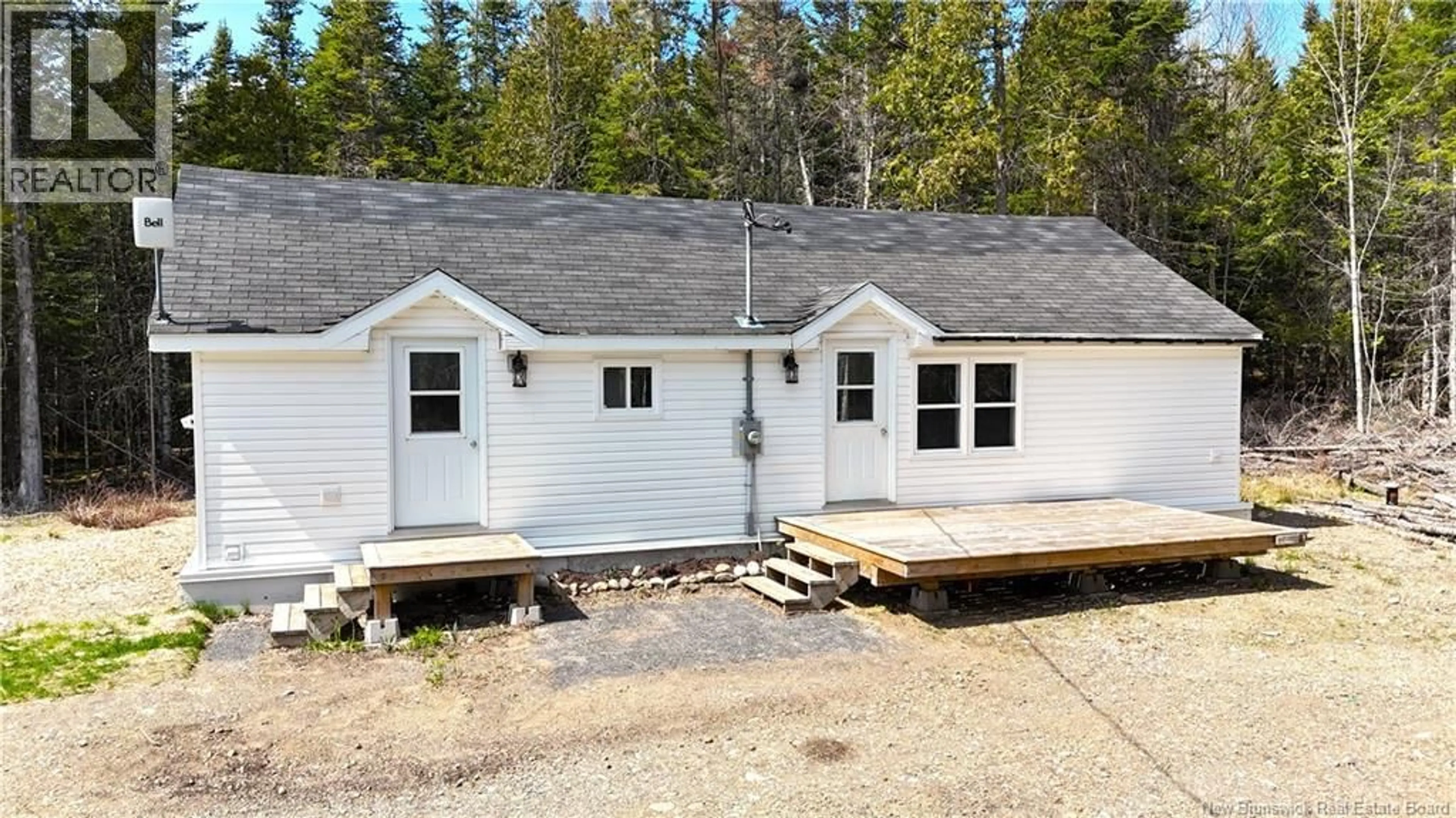 Home with vinyl exterior material, street for 39 HARKNESS ROAD, Chamcook New Brunswick E5B3E7