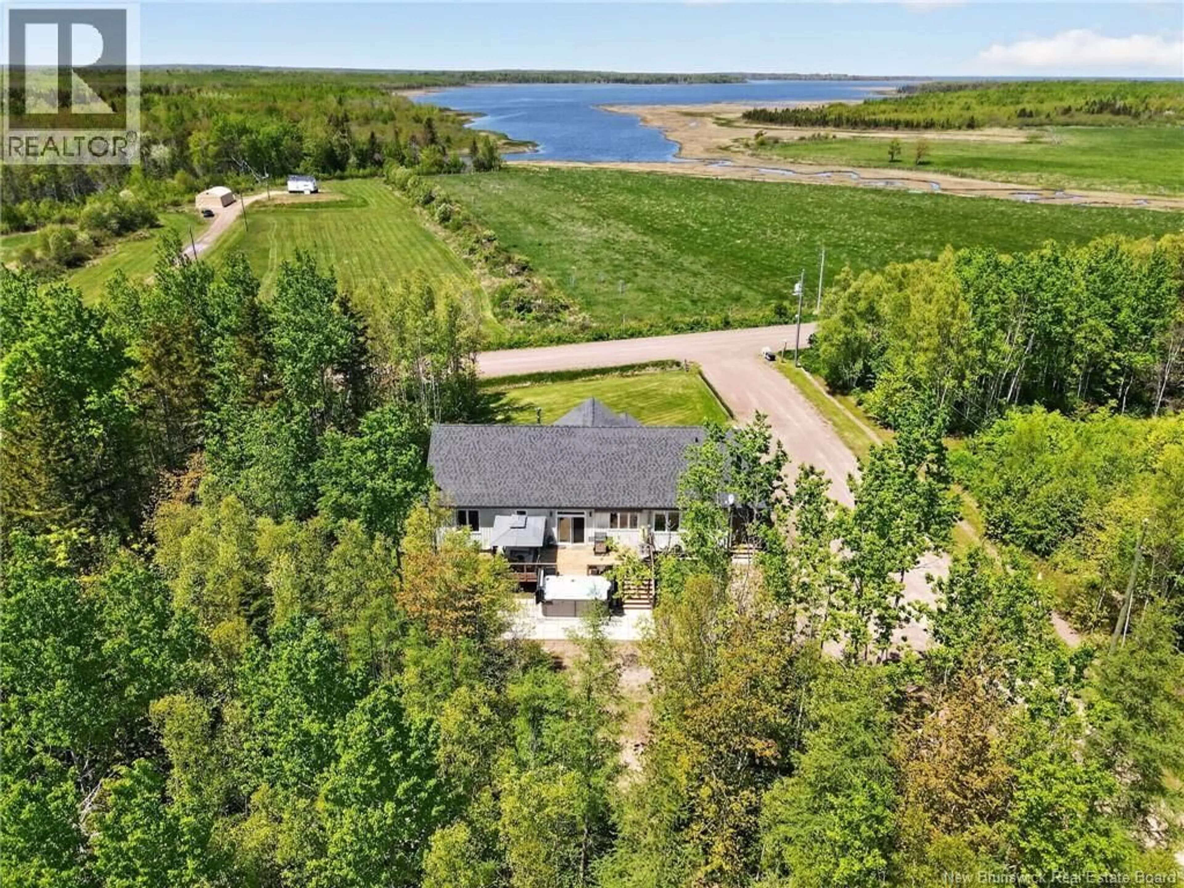 A pic from outside/outdoor area/front of a property/back of a property/a pic from drone, water/lake/river/ocean view for 133 DUGUAY POINT ROAD, Johnston Point New Brunswick E4M3W6