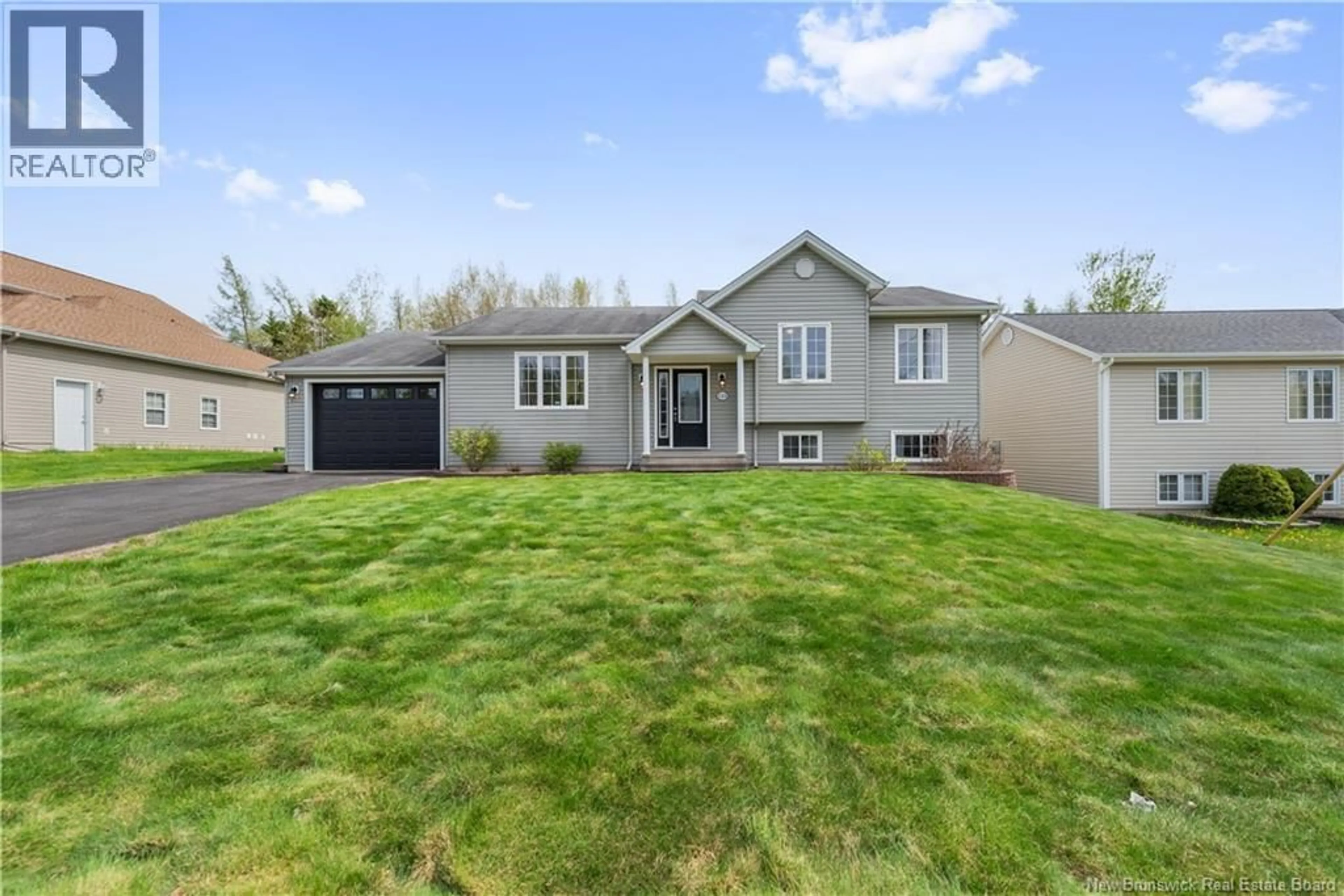 Home with vinyl exterior material, street for 123 FABIEN STREET, Dieppe New Brunswick E1A8S2