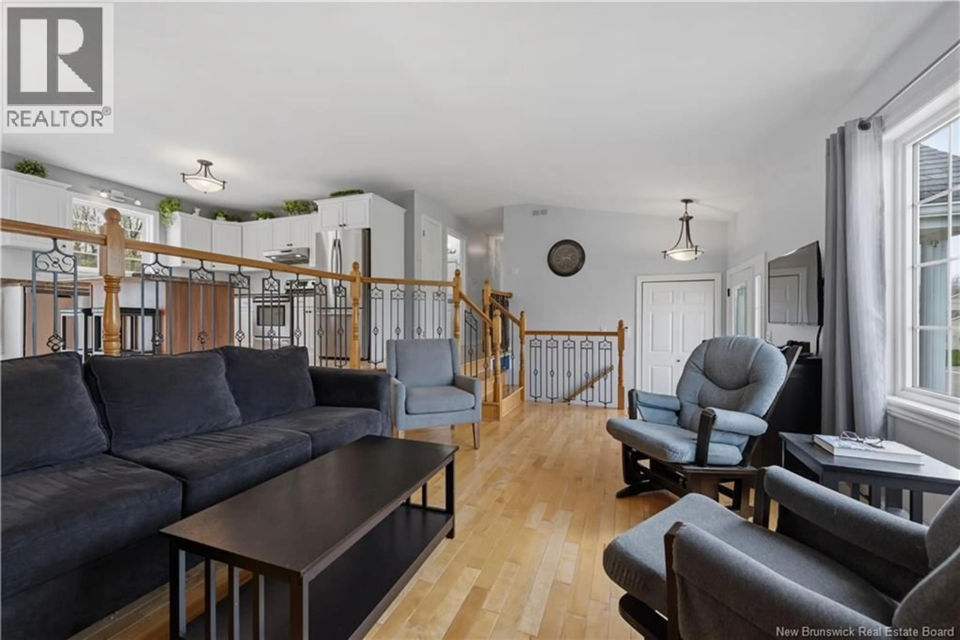Living room with furniture, wood/laminate floor for 123 FABIEN STREET, Dieppe New Brunswick E1A8S2