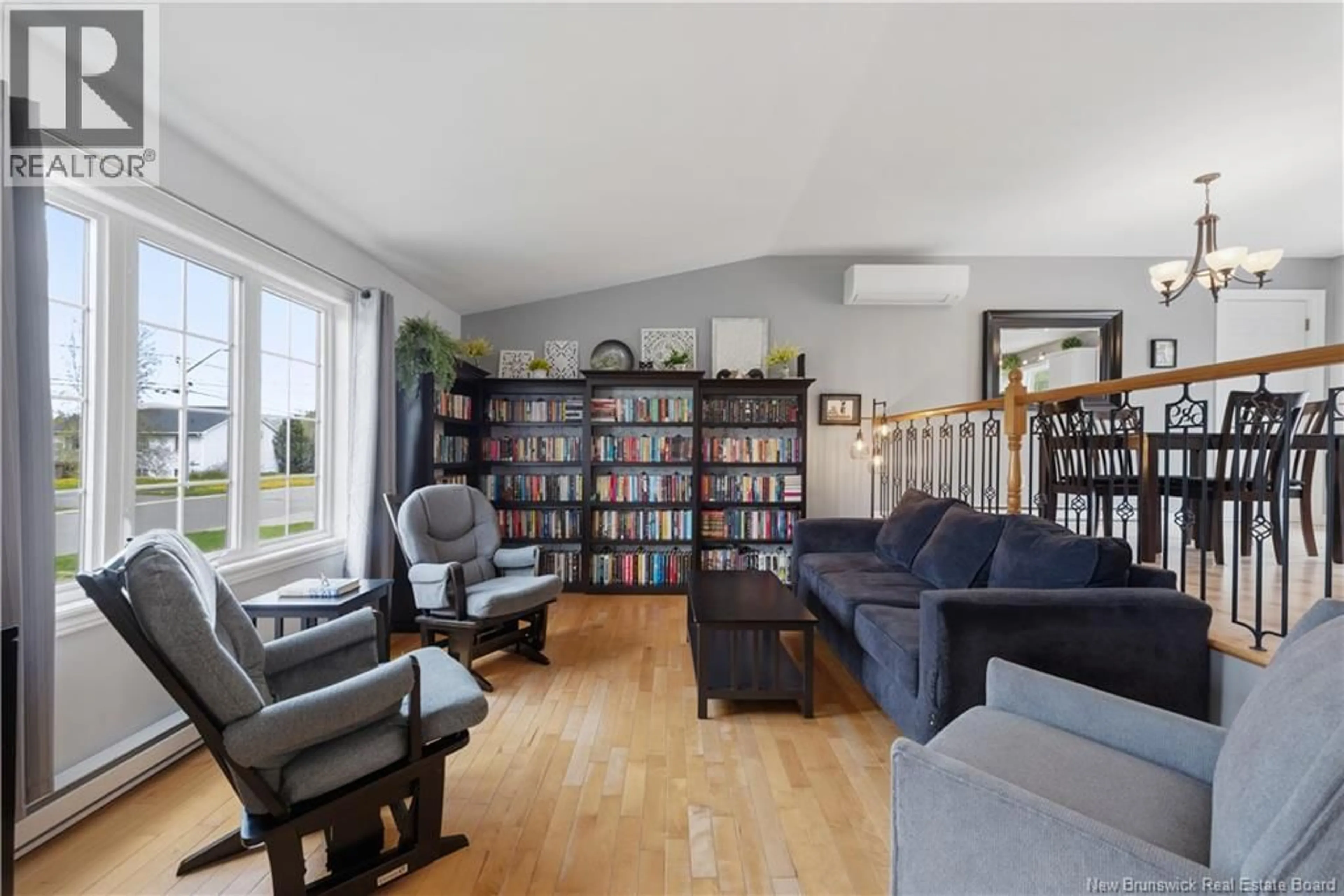 Living room with furniture, wood/laminate floor for 123 FABIEN STREET, Dieppe New Brunswick E1A8S2