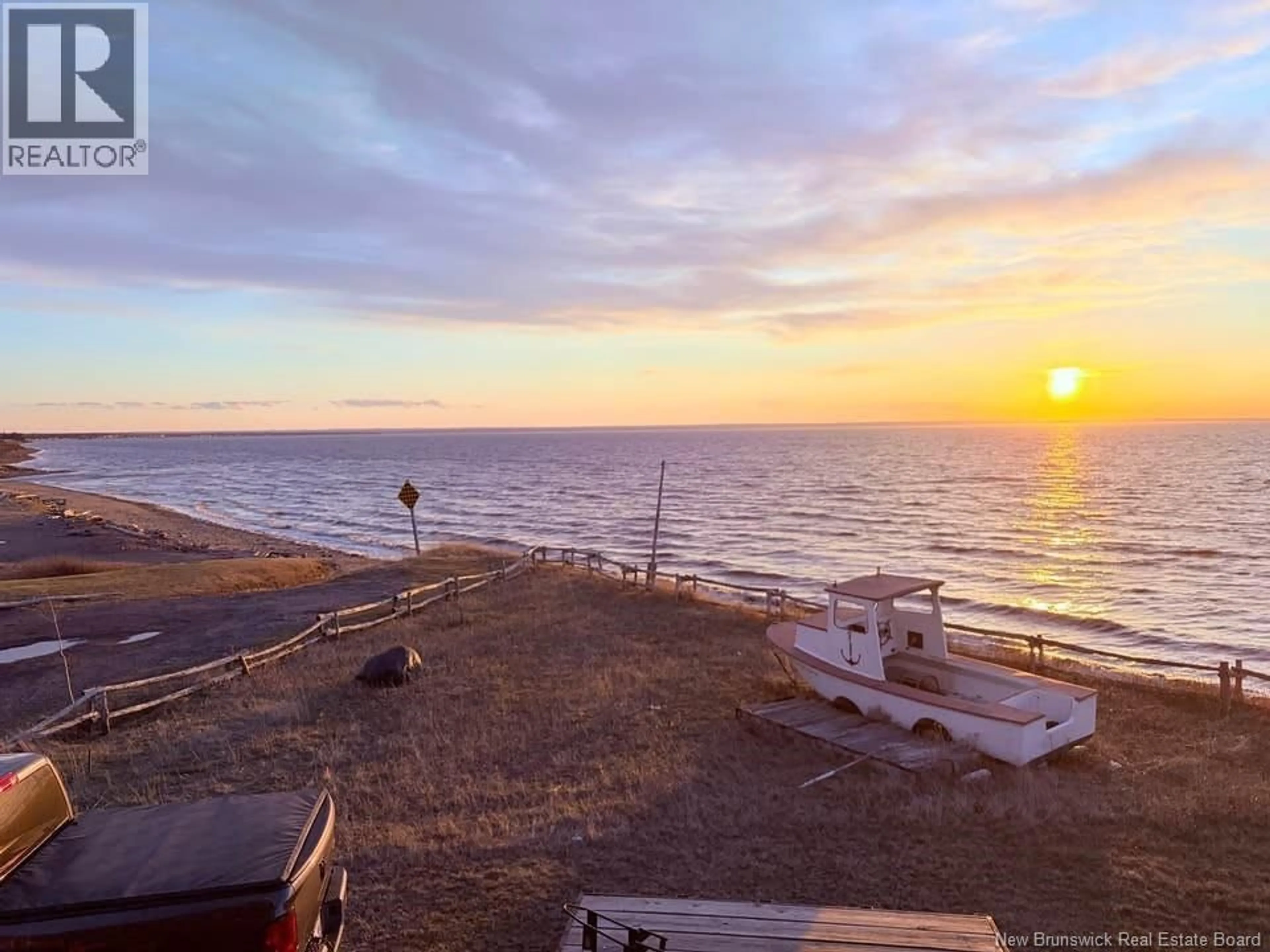 A pic from outside/outdoor area/front of a property/back of a property/a pic from drone, water/lake/river/ocean view for 27 JANEVILLE BEACH ROAD, Janeville New Brunswick E2A5K3