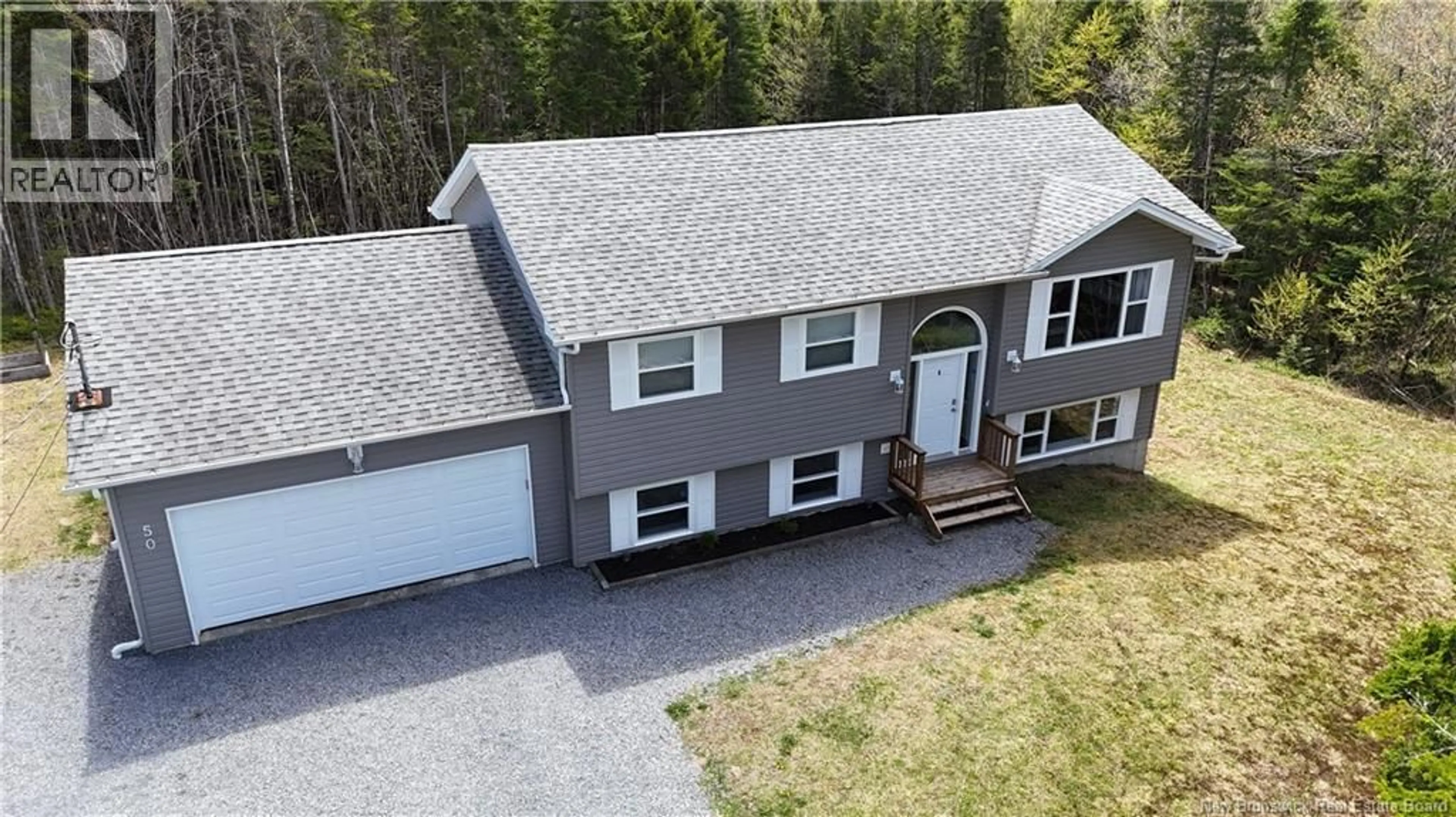 A pic from outside/outdoor area/front of a property/back of a property/a pic from drone, unknown for 50 KIMBERLY STREET, Saint John New Brunswick E2N0B3