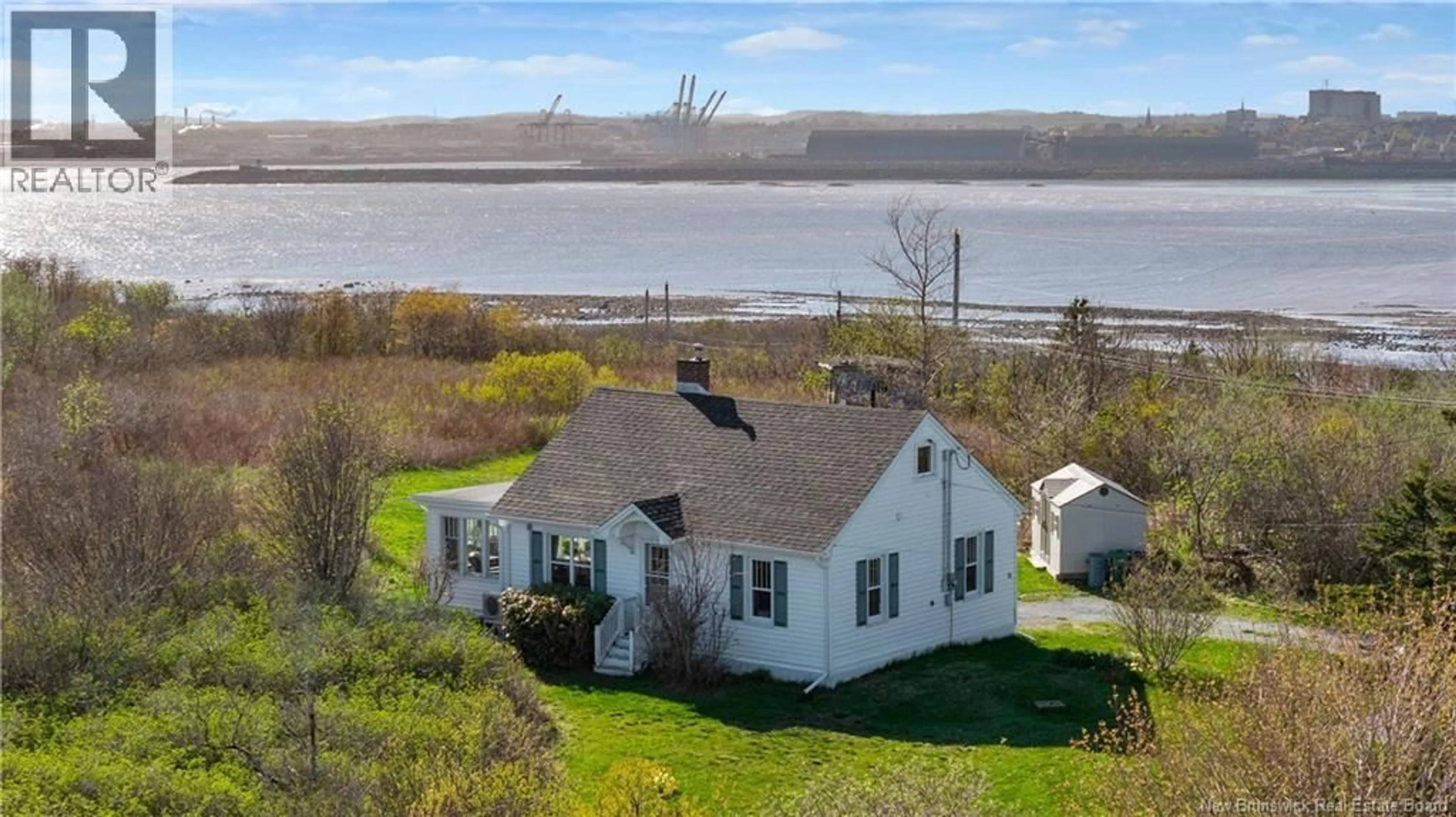 A pic from outside/outdoor area/front of a property/back of a property/a pic from drone, water/lake/river/ocean view for 21 OLD RED HEAD ROAD, Saint John New Brunswick E2P1J6