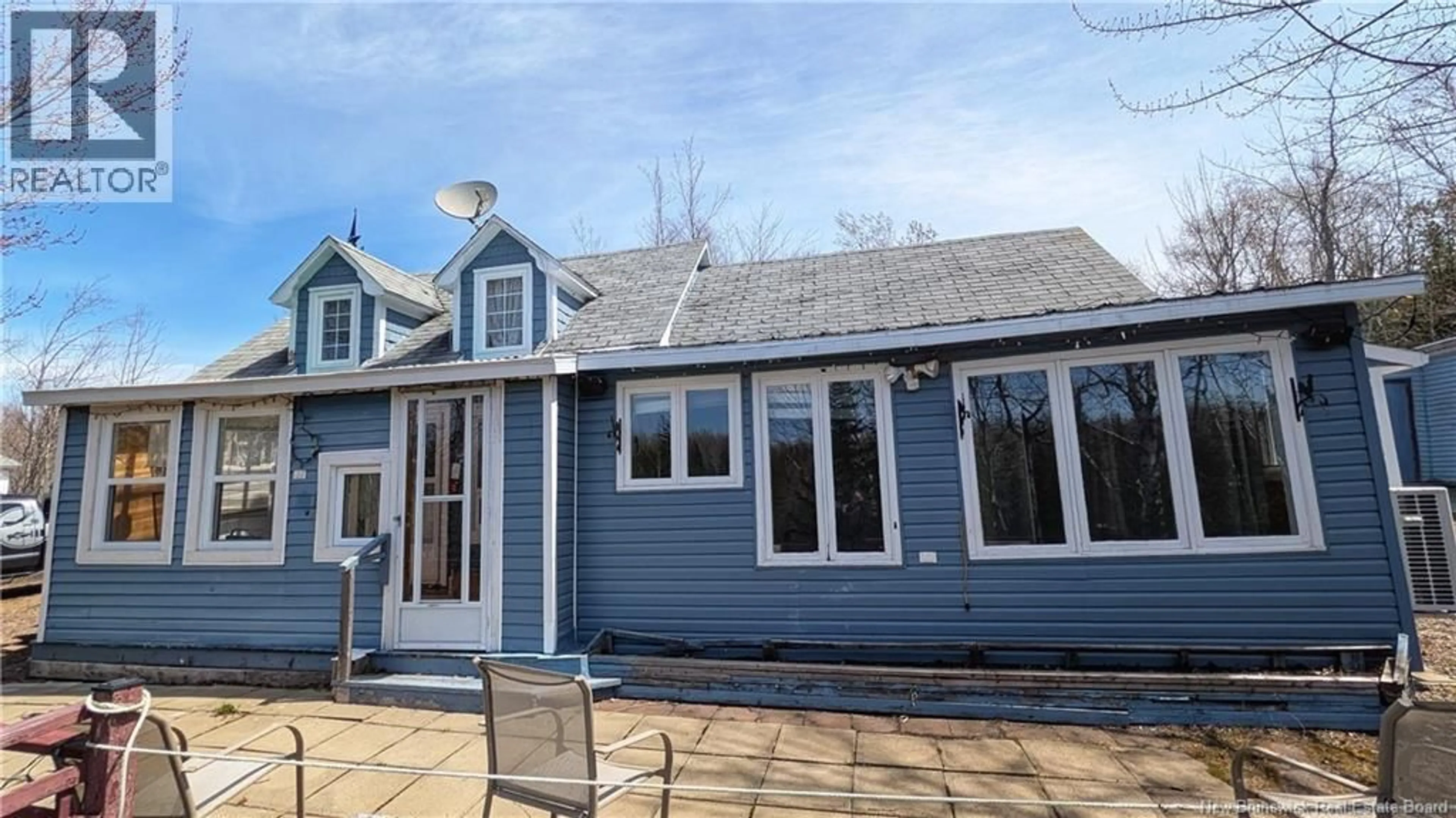 Home with vinyl exterior material, street for 5 CHEM. DU BOOM, Bertrand New Brunswick E1W1M5