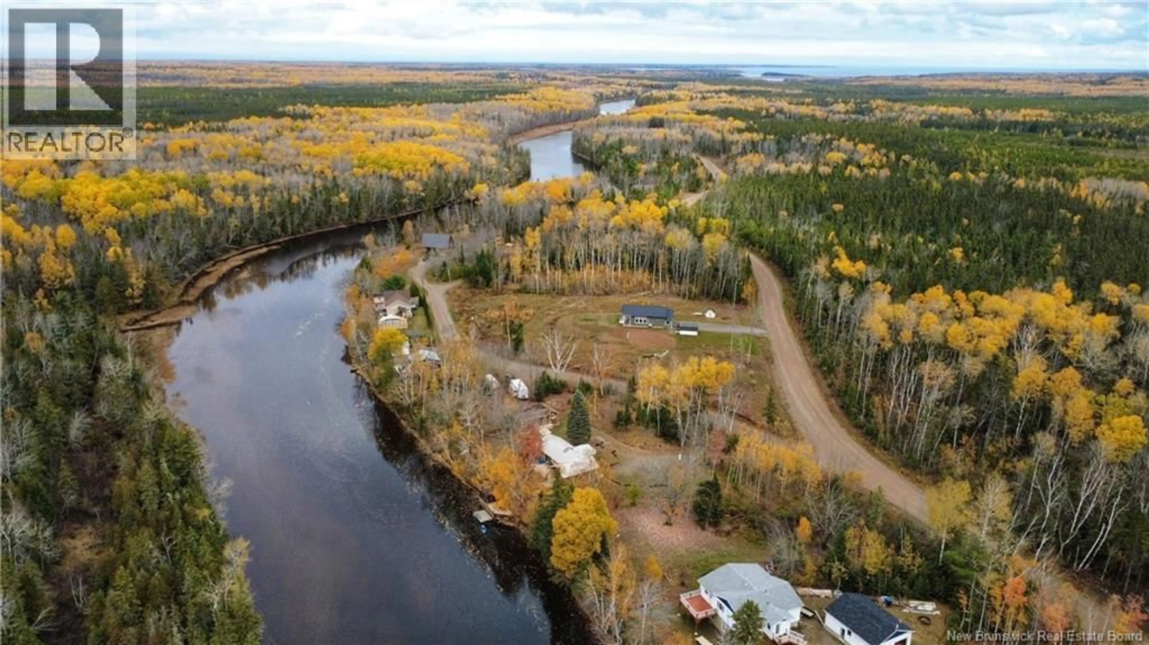 A pic from outside/outdoor area/front of a property/back of a property/a pic from drone, water/lake/river/ocean view for 5 CHEM. DU BOOM, Bertrand New Brunswick E1W1M5