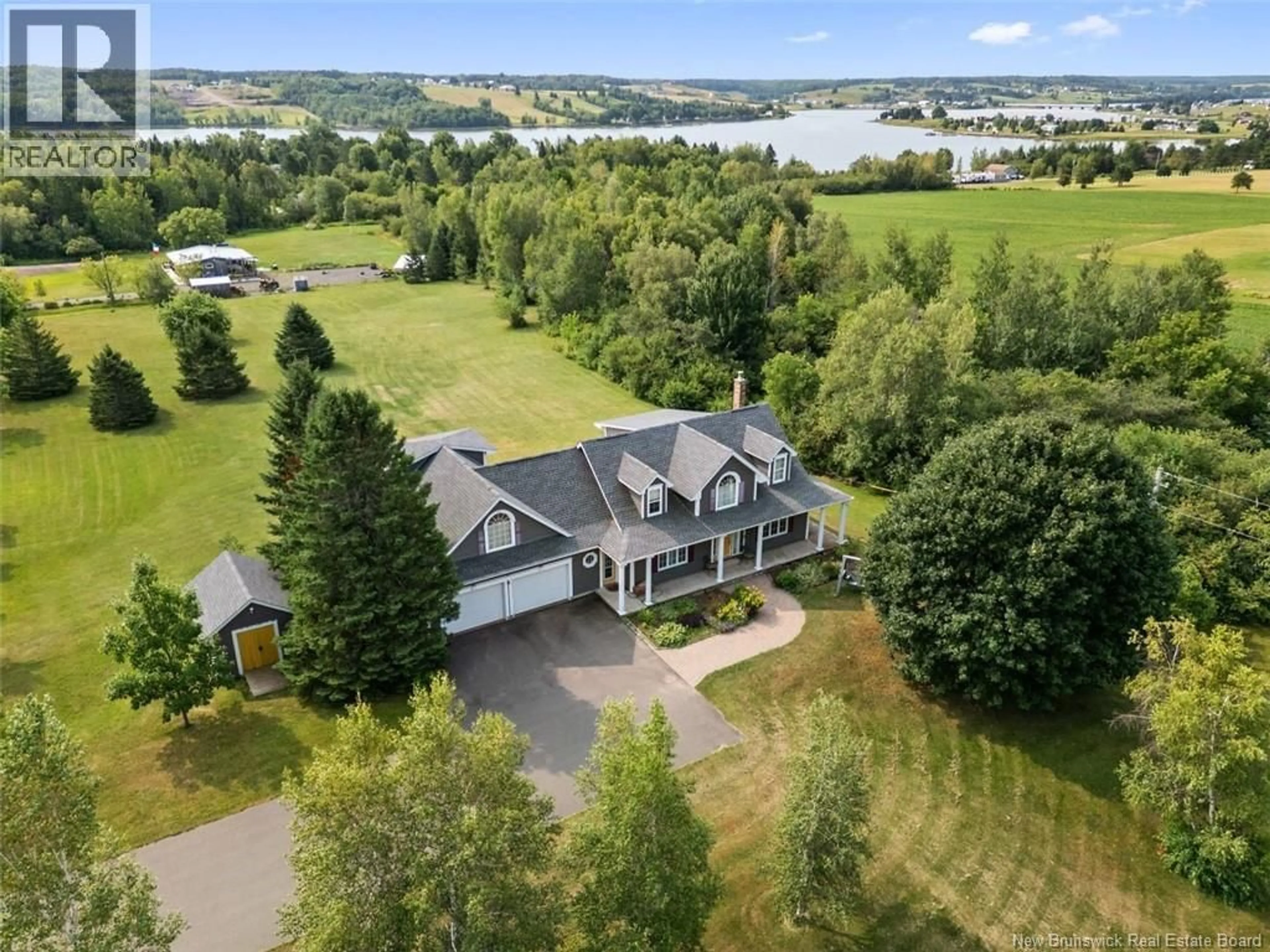 A pic from outside/outdoor area/front of a property/back of a property/a pic from drone, water/lake/river/ocean view for 10 COTE A VICTOR, Sainte-Marie-De-Kent New Brunswick E4S1R9