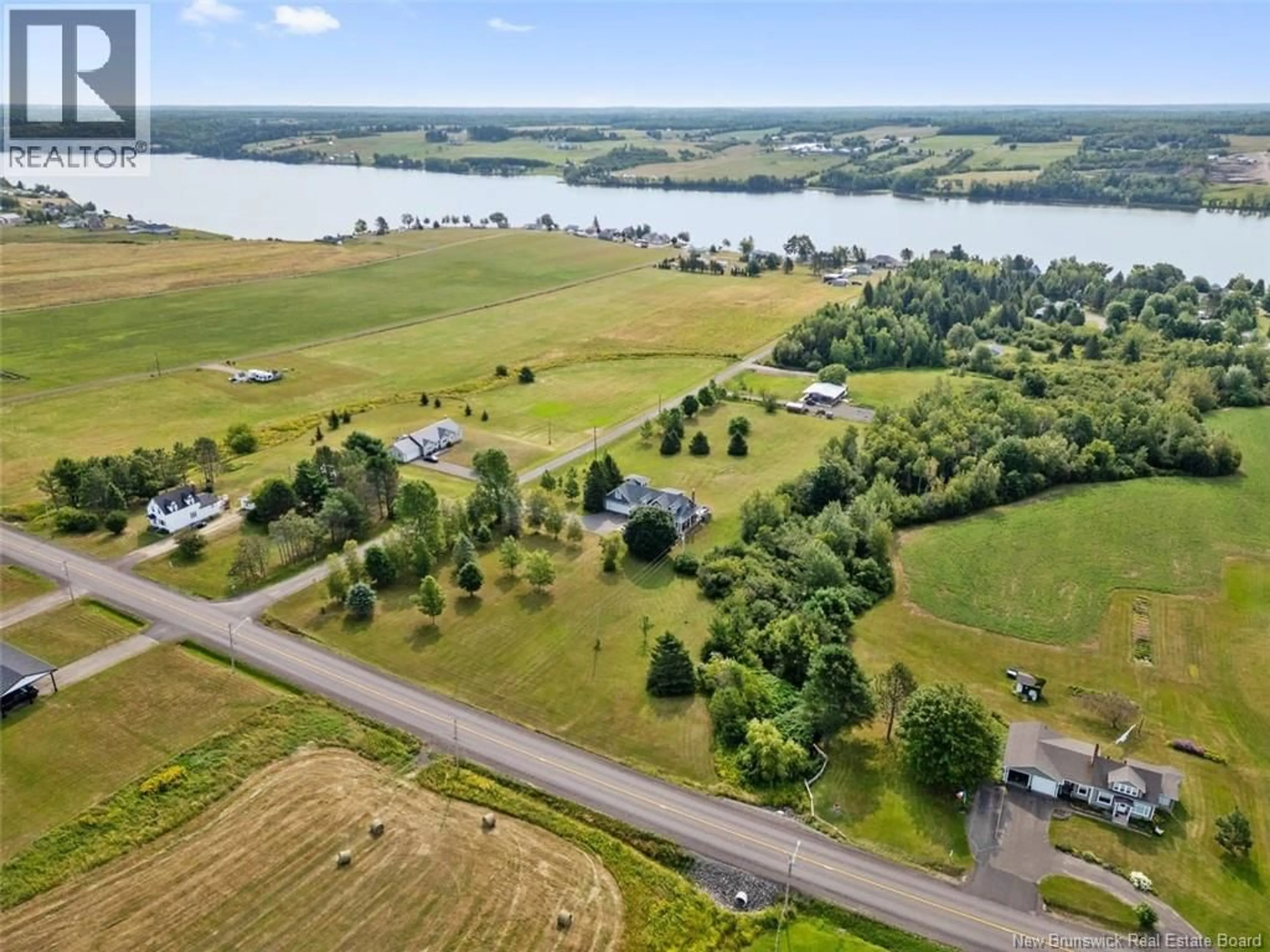 A pic from outside/outdoor area/front of a property/back of a property/a pic from drone, water/lake/river/ocean view for 10 COTE A VICTOR, Sainte-Marie-De-Kent New Brunswick E4S1R9