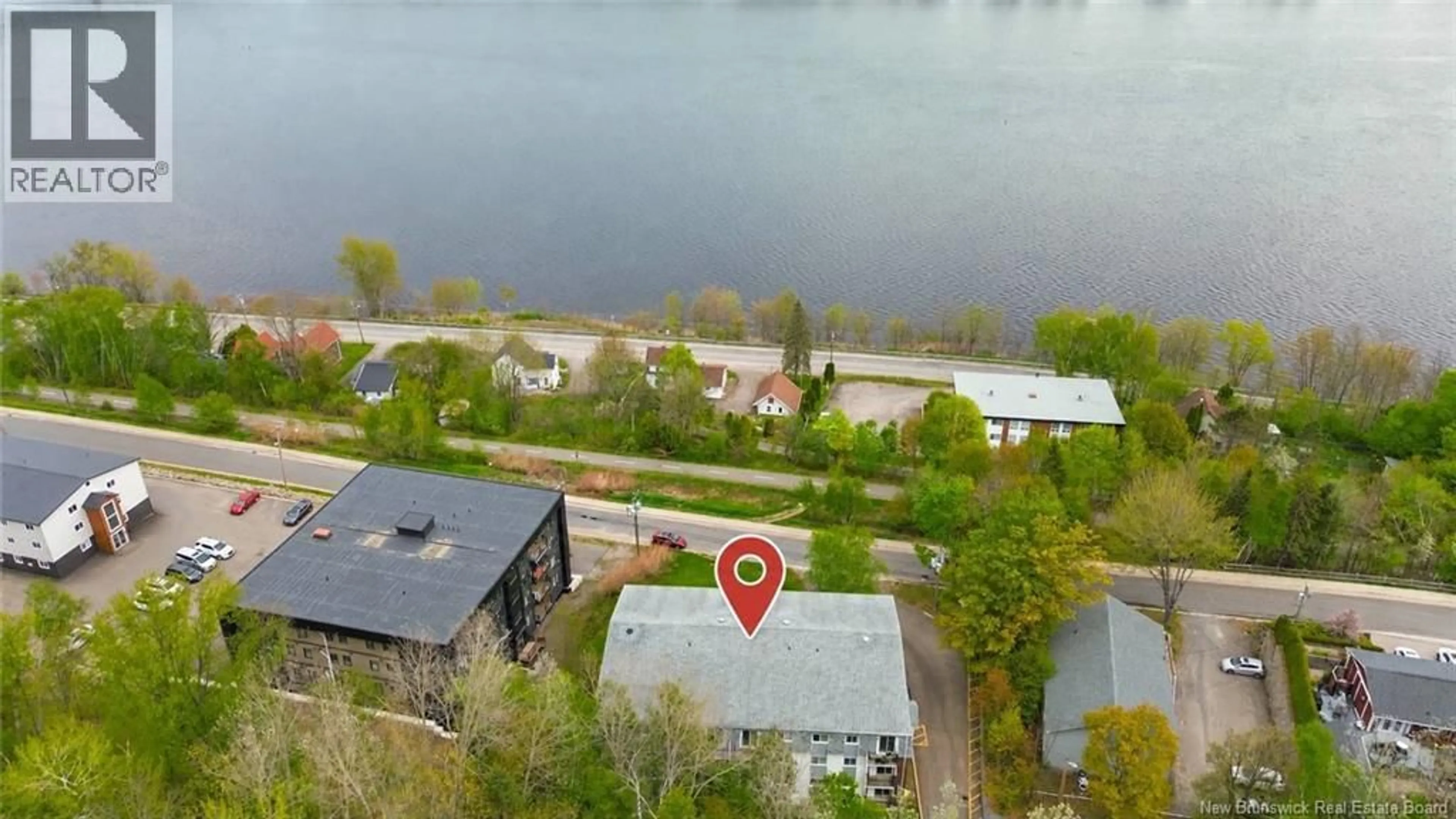 A pic from outside/outdoor area/front of a property/back of a property/a pic from drone, water/lake/river/ocean view for 17 - 228 DUNNS CROSSING STREET, Fredericton New Brunswick E3B2A6