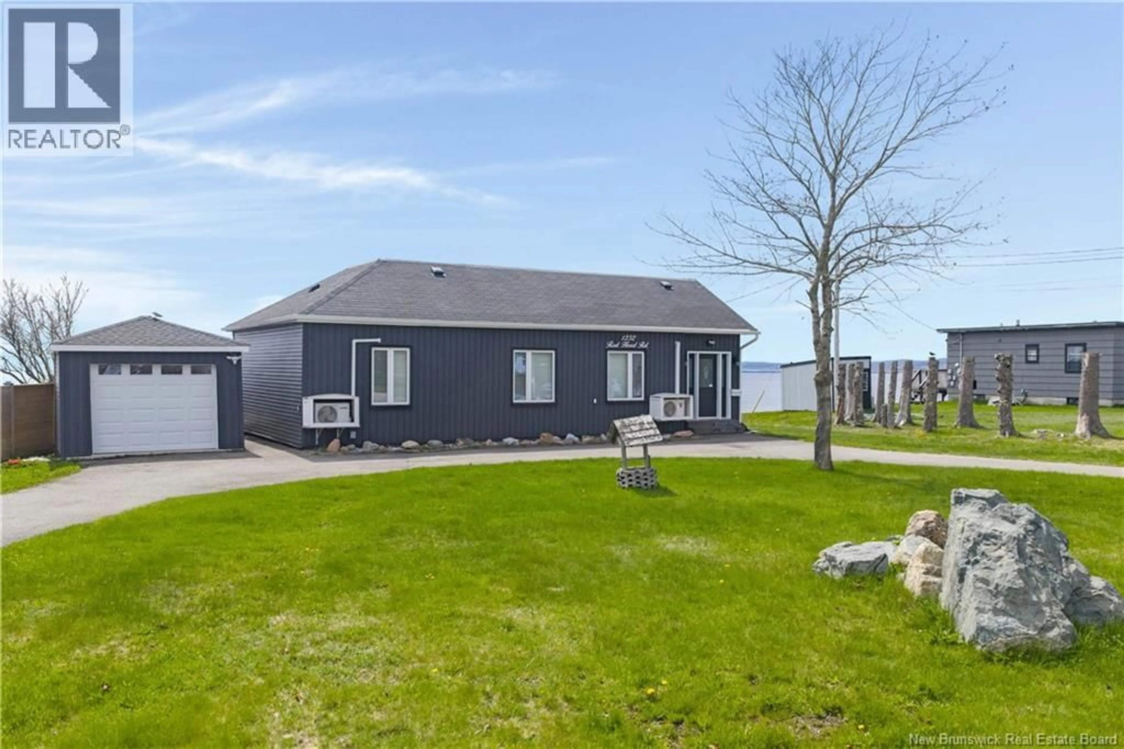 A pic from outside/outdoor area/front of a property/back of a property/a pic from drone, street for 1232 RED HEAD, Saint John New Brunswick E2P1K3