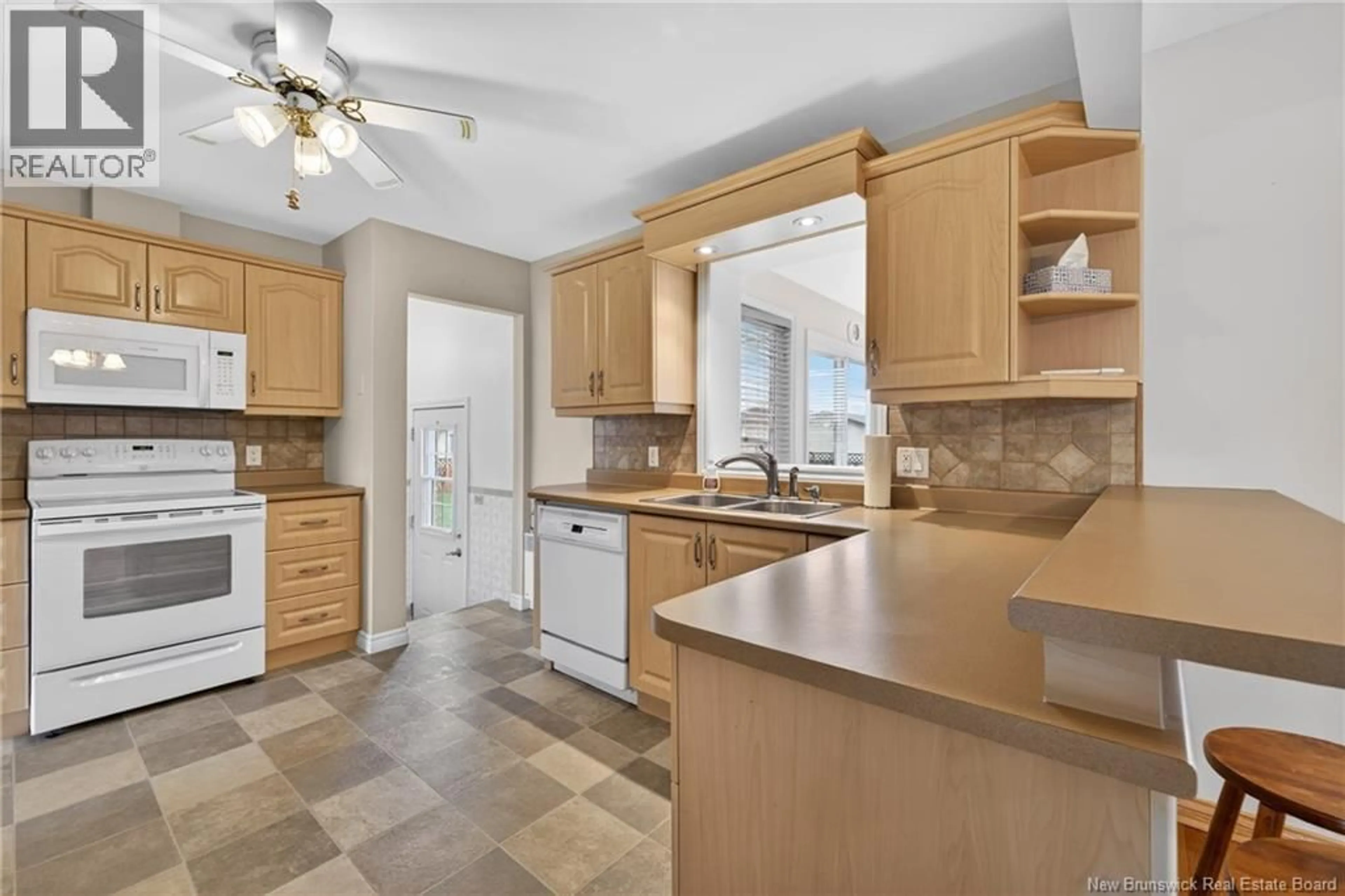 Open concept kitchen, ceramic/tile floor for 1145 DANIEL DRIVE, Bathurst New Brunswick E2A3X6