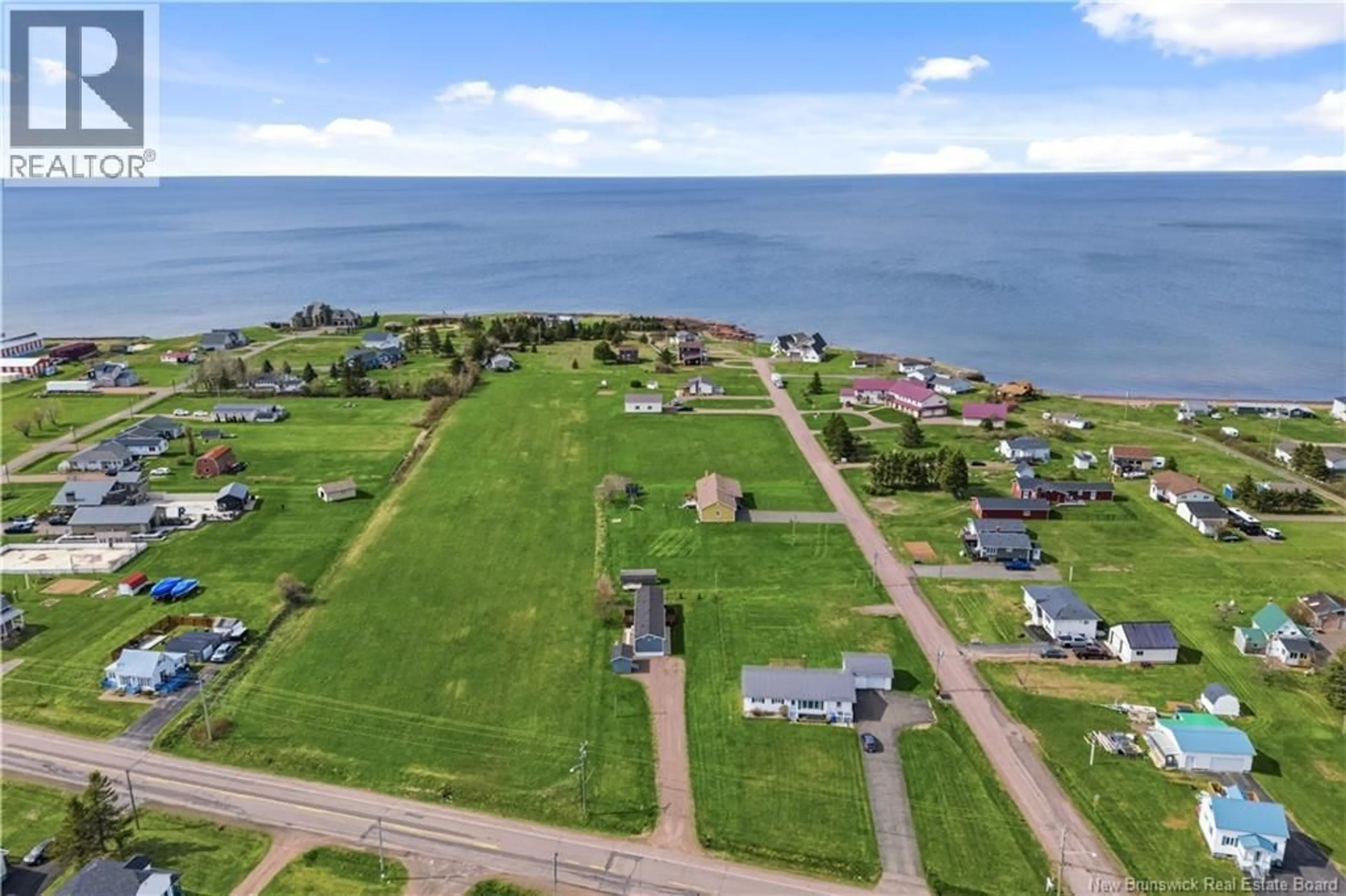 A pic from outside/outdoor area/front of a property/back of a property/a pic from drone, water/lake/river/ocean view for 670 CHEMIN BAS-CAP PELE, Cap-Pelé New Brunswick E4N1J5