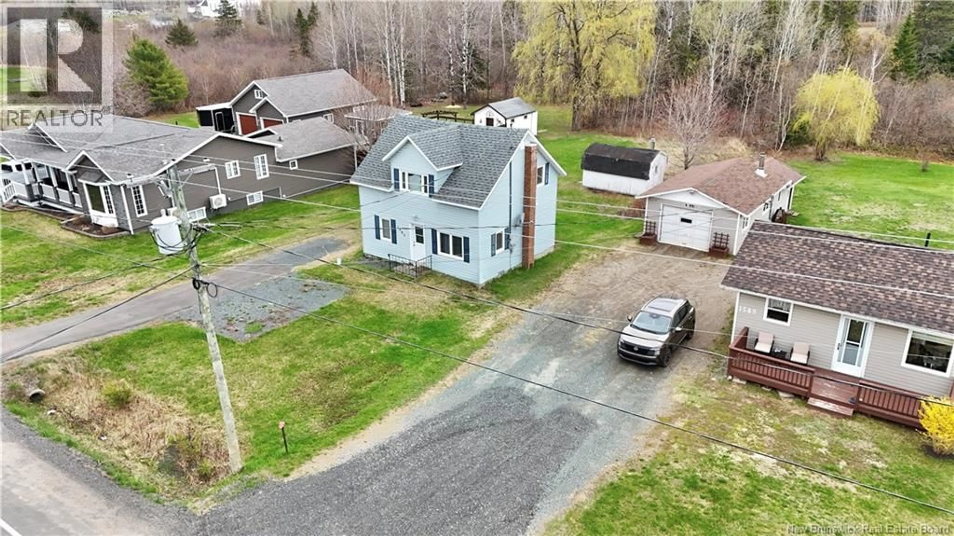 A pic from outside/outdoor area/front of a property/back of a property/a pic from drone, street for 1585 ROBERTVILLE, Robertville New Brunswick E8K2T5