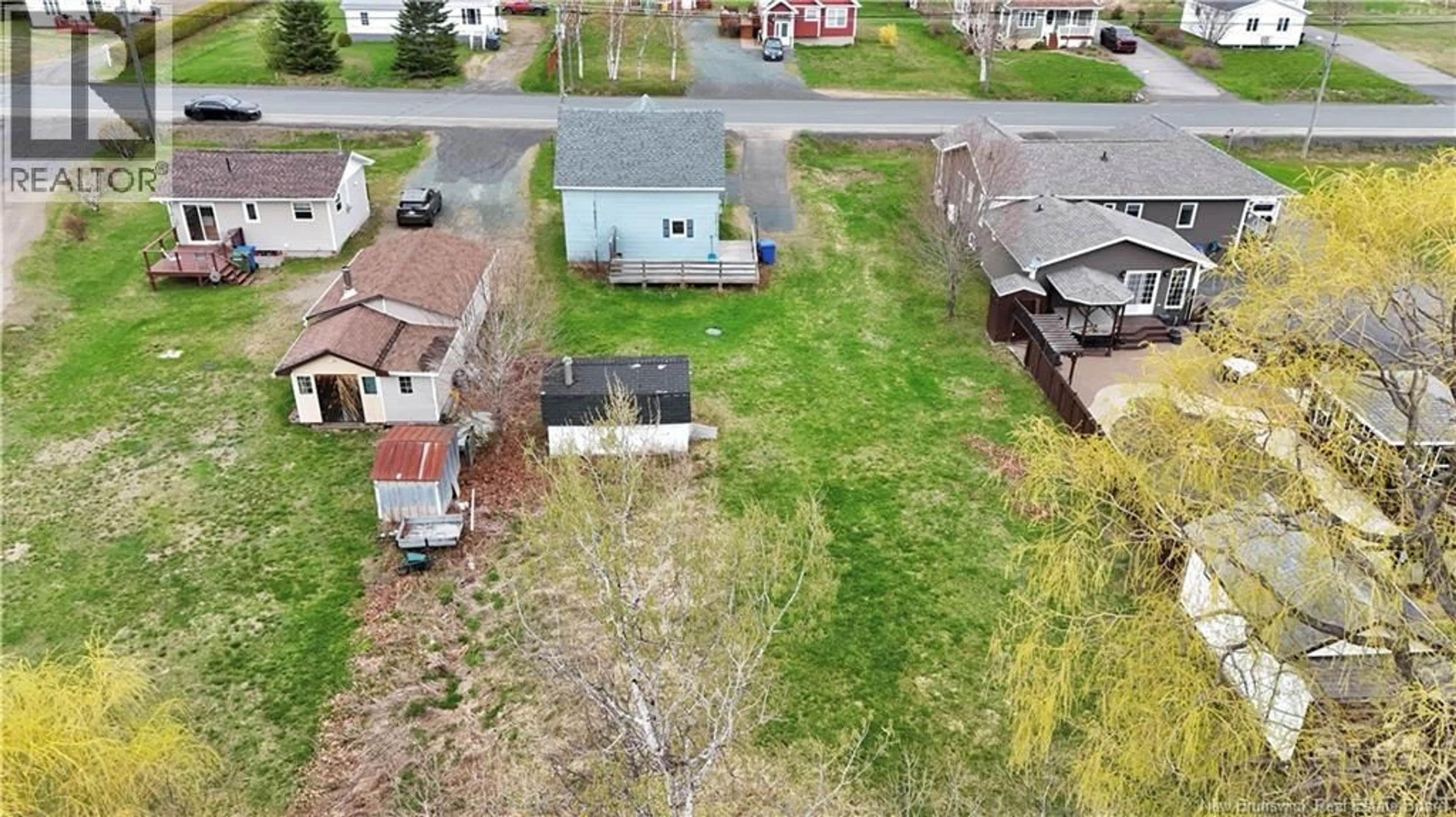 A pic from outside/outdoor area/front of a property/back of a property/a pic from drone, street for 1585 ROBERTVILLE, Robertville New Brunswick E8K2T5