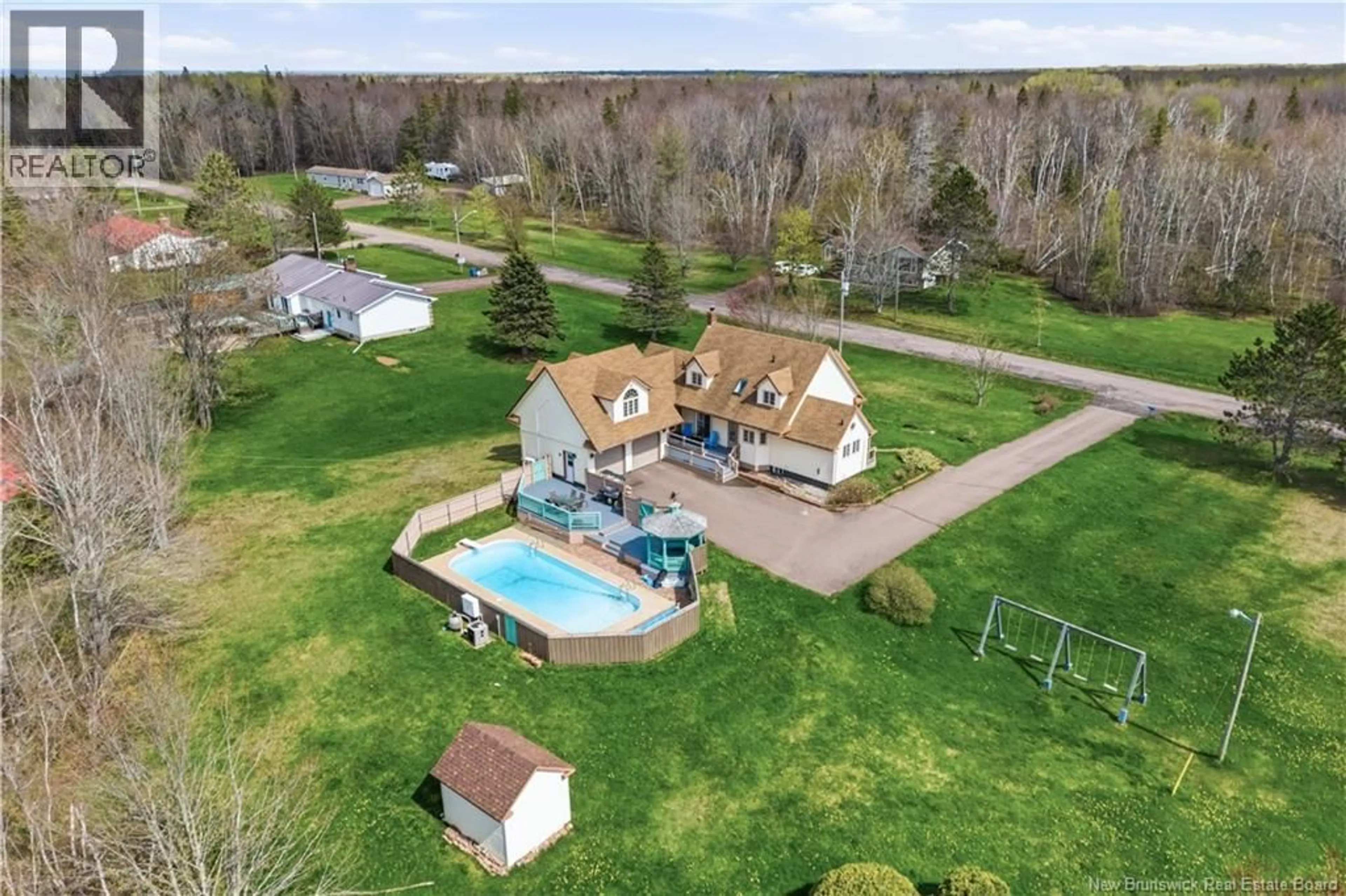 A pic from outside/outdoor area/front of a property/back of a property/a pic from drone, water/lake/river/ocean view for 12 THADDEE ROAD, Cap-Pelé New Brunswick E4N3B1