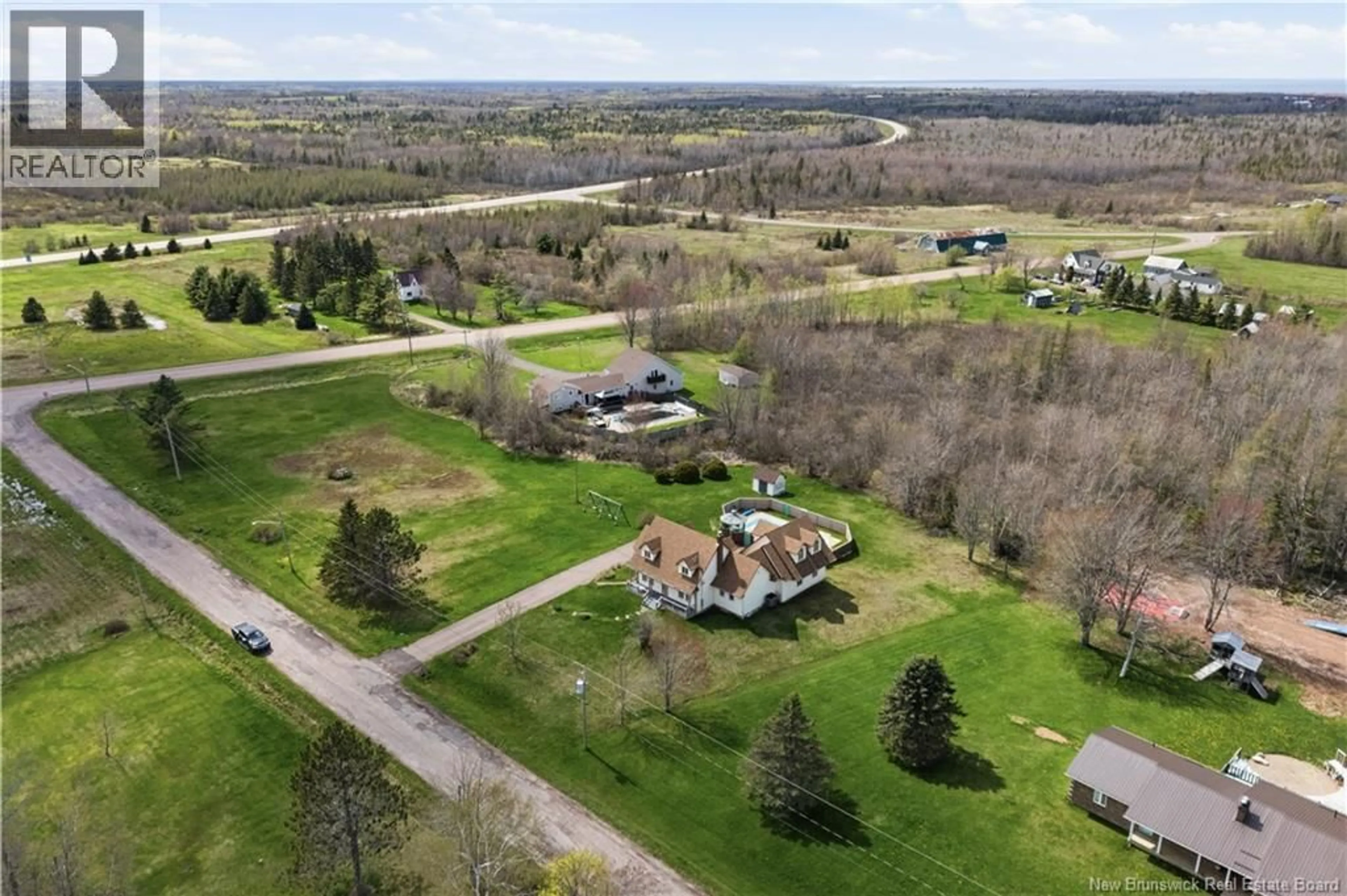 A pic from outside/outdoor area/front of a property/back of a property/a pic from drone, street for 12 THADDEE ROAD, Cap-Pelé New Brunswick E4N3B1