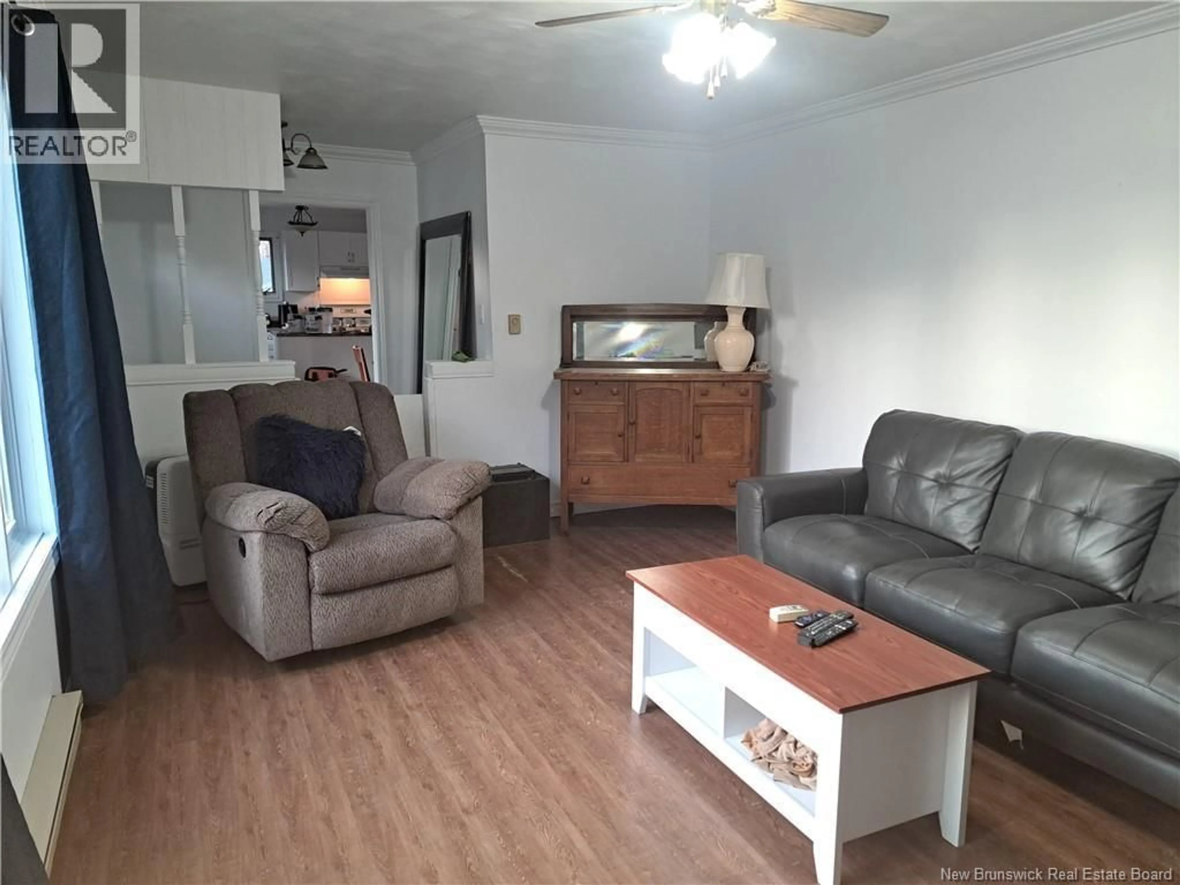 Living room with furniture, wood/laminate floor for 2943 MIDDLE RIVER ROAD, Middle River New Brunswick E2A6X9