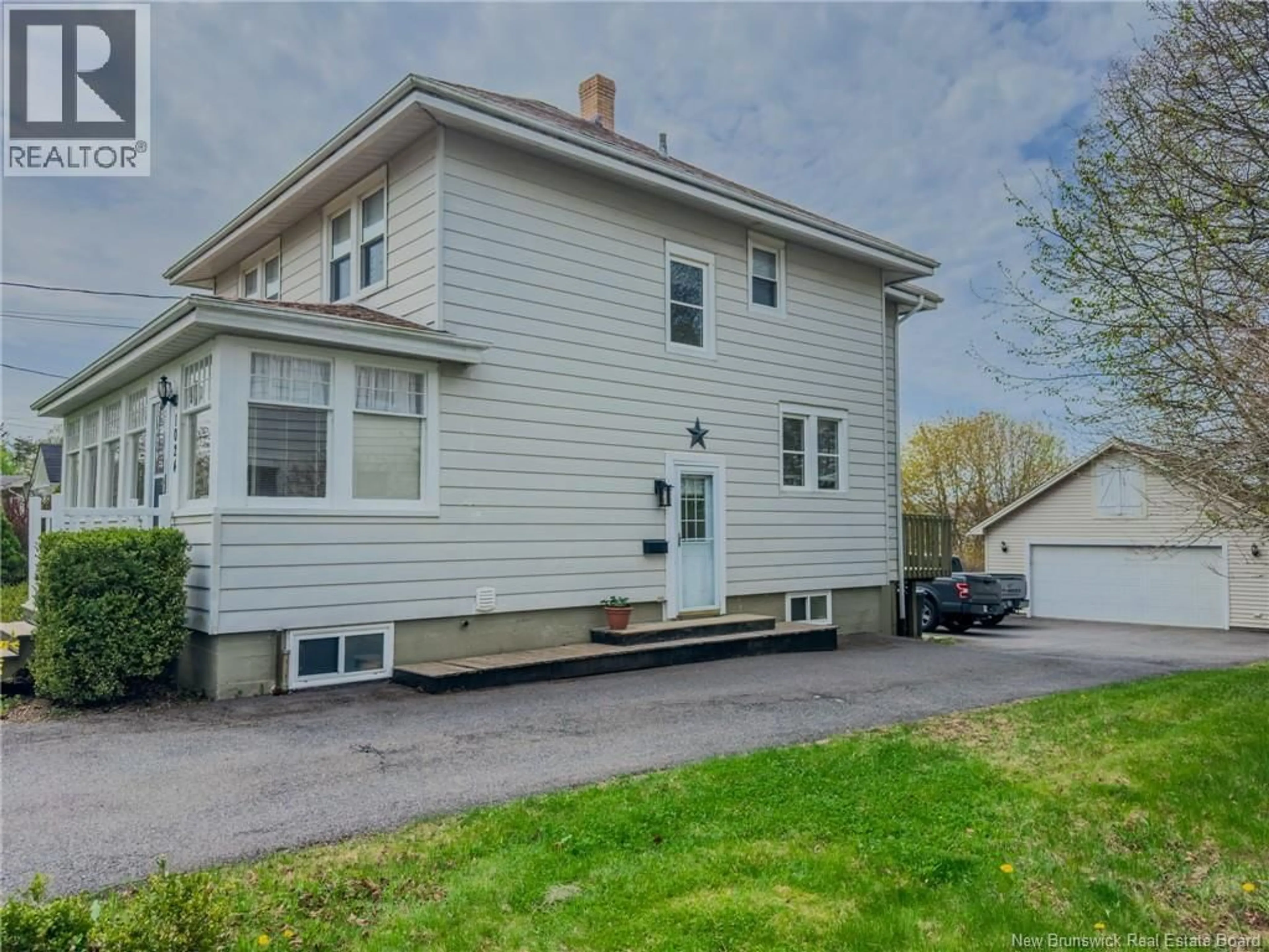 Home with vinyl exterior material, street for 1024 MANAWAGONISH ROAD, Saint John New Brunswick E2M3X3