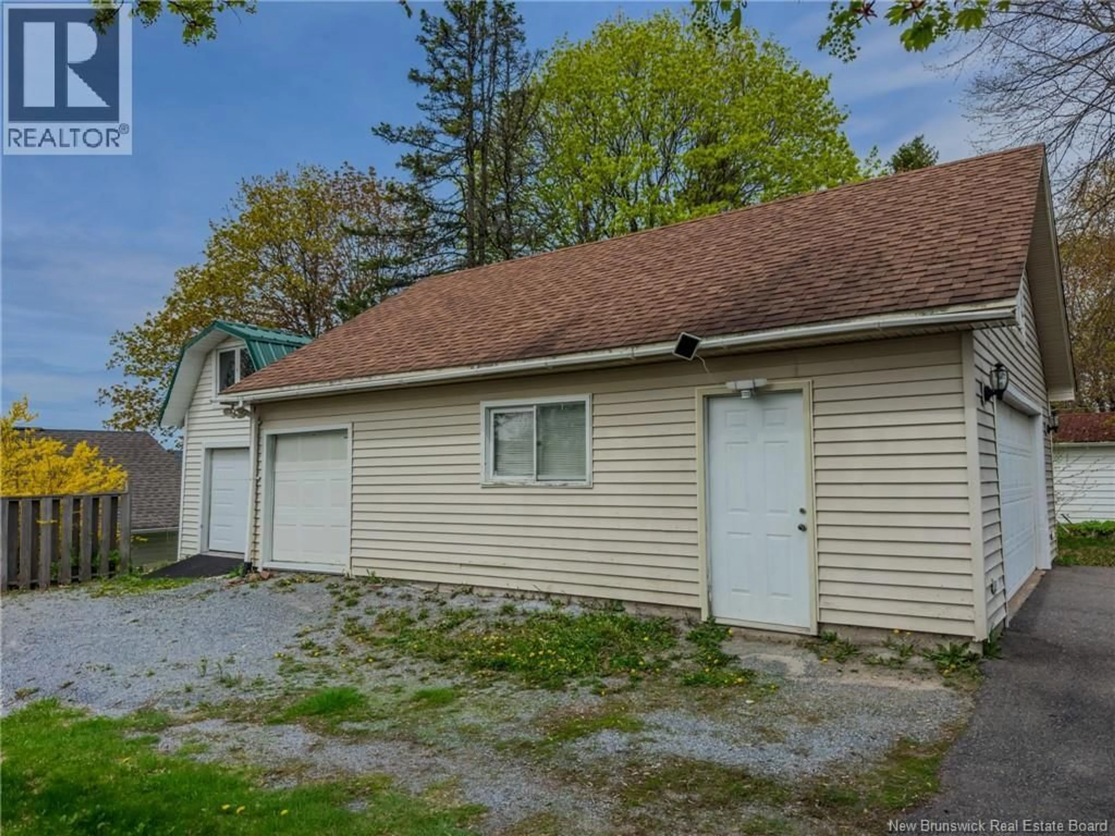 A pic from outside/outdoor area/front of a property/back of a property/a pic from drone, street for 1024 MANAWAGONISH ROAD, Saint John New Brunswick E2M3X3