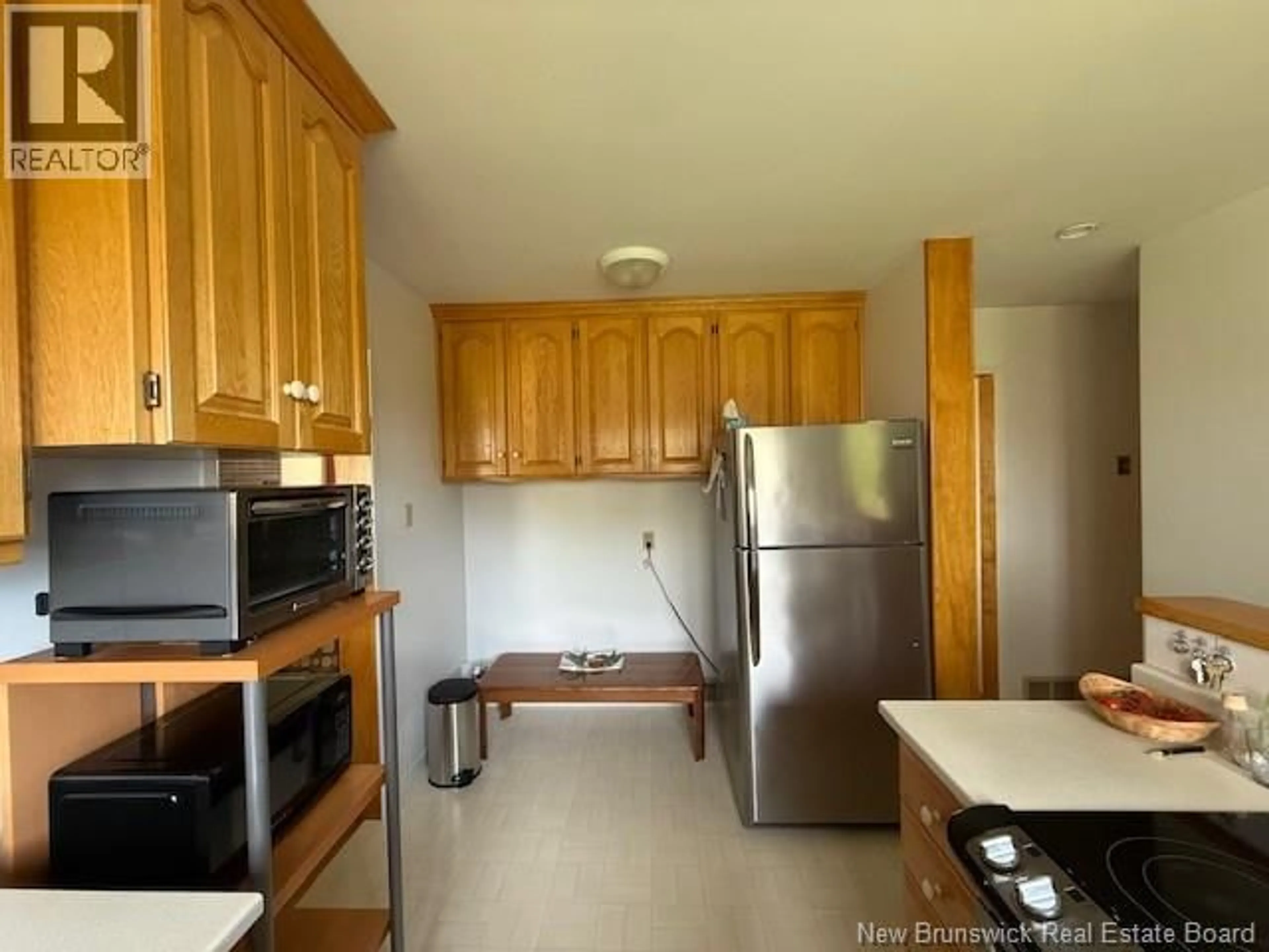 Standard kitchen, wood/laminate floor for 114 CHALEUR STREET, Charlo New Brunswick E8E2E8