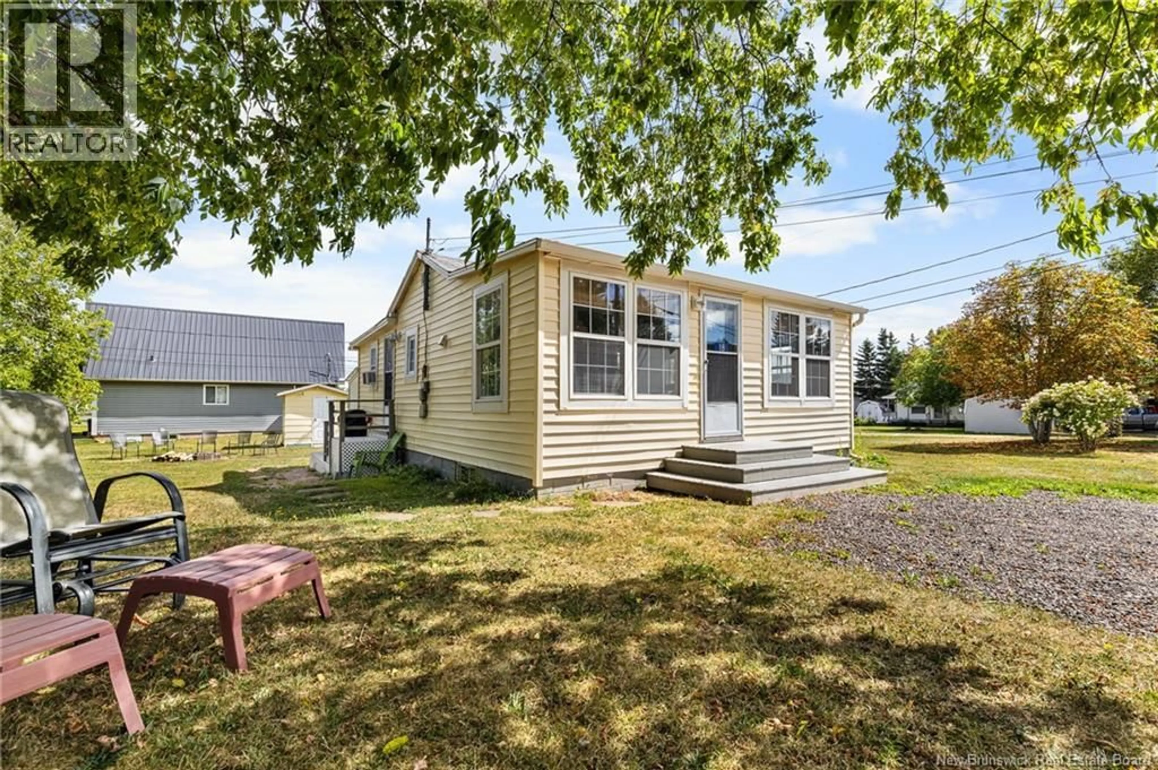 Home with vinyl exterior material, street for 18 PELICAN AVENUE, Grand-Barachois New Brunswick E4P7Z3