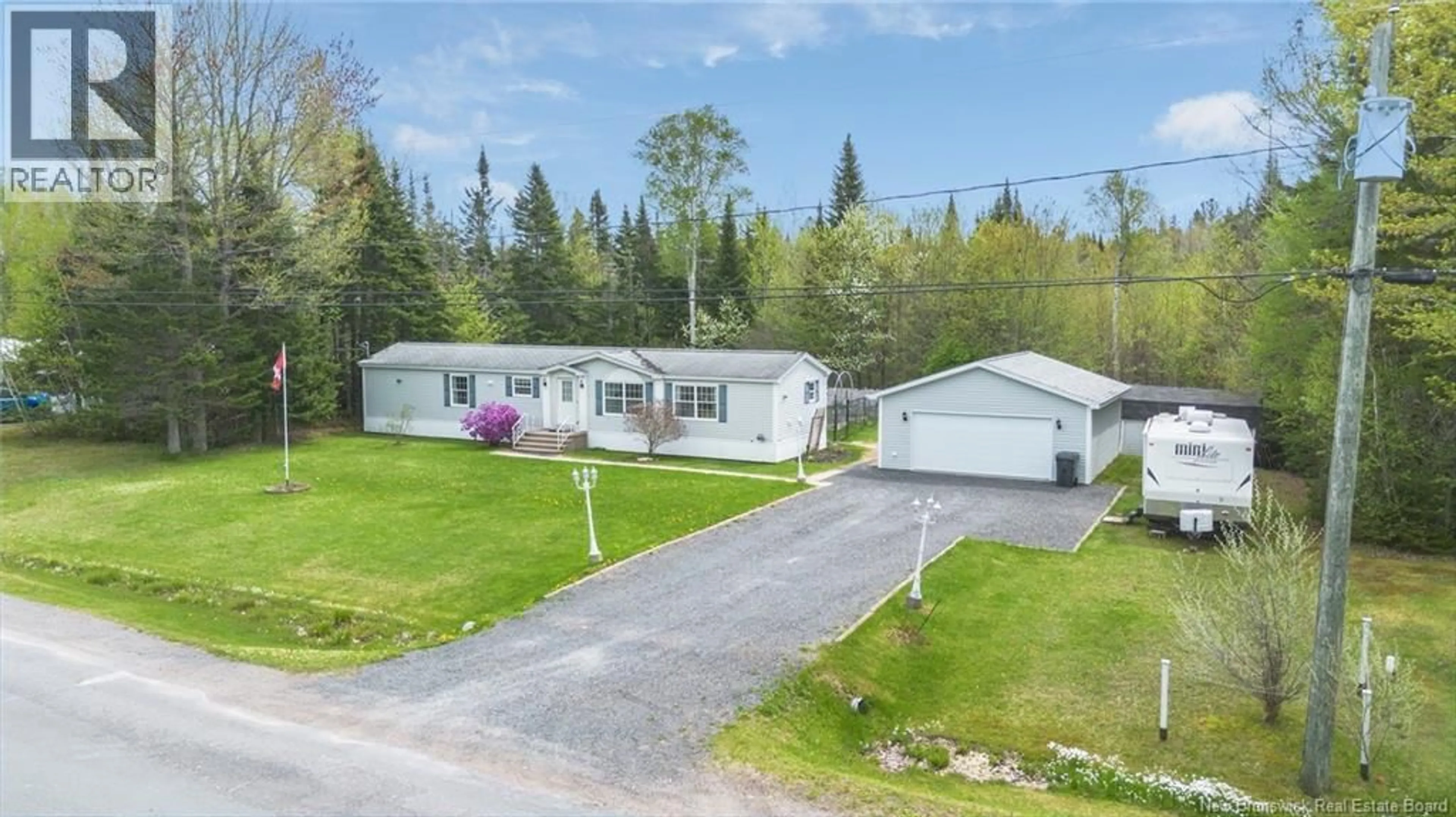 A pic from outside/outdoor area/front of a property/back of a property/a pic from drone, street for 32 PRESTIGE DRIVE, Lincoln New Brunswick E3B7G9
