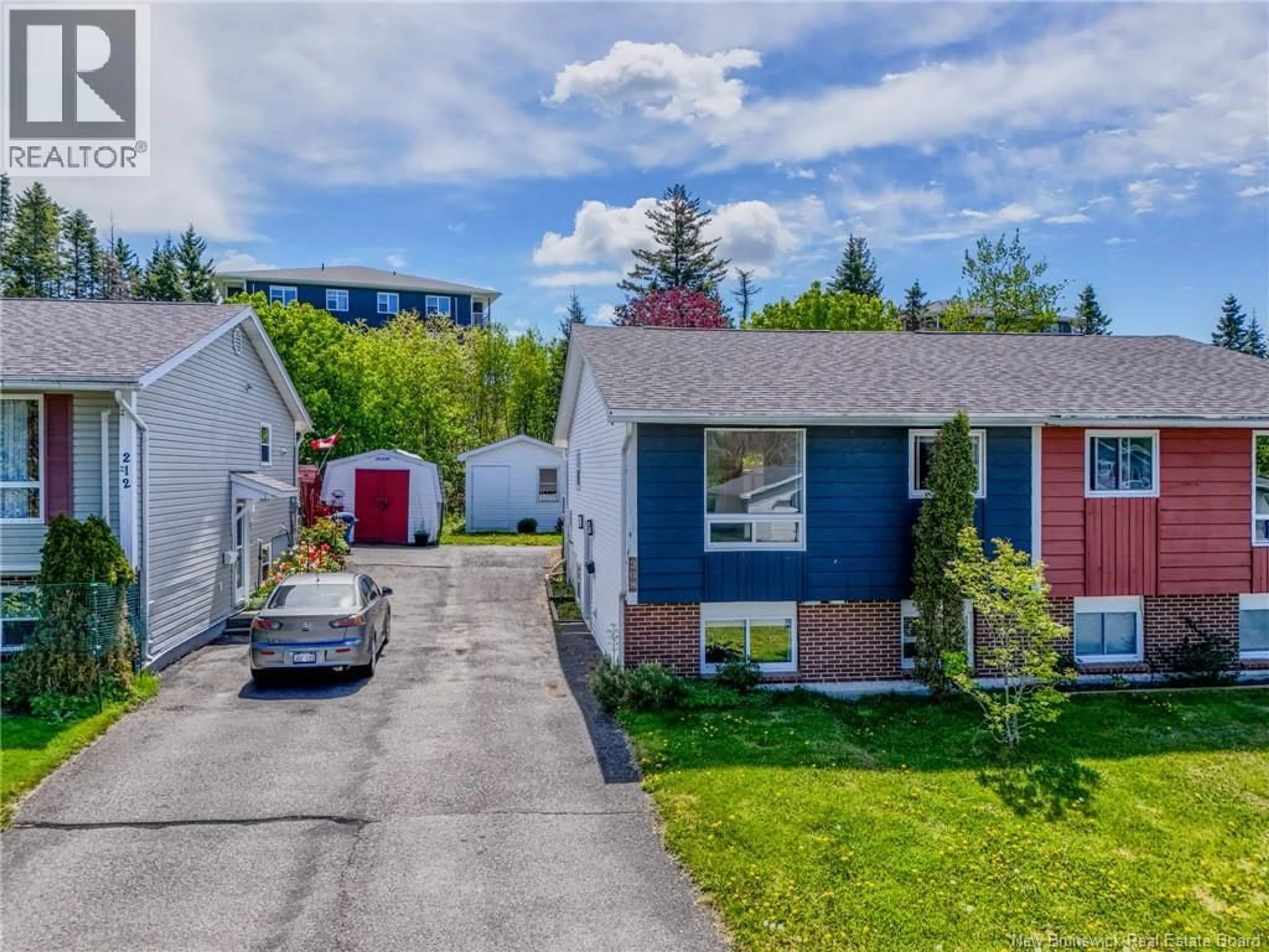 A pic from outside/outdoor area/front of a property/back of a property/a pic from drone, street for 208 BOYANER CRESCENT, Saint John New Brunswick E2J4C4