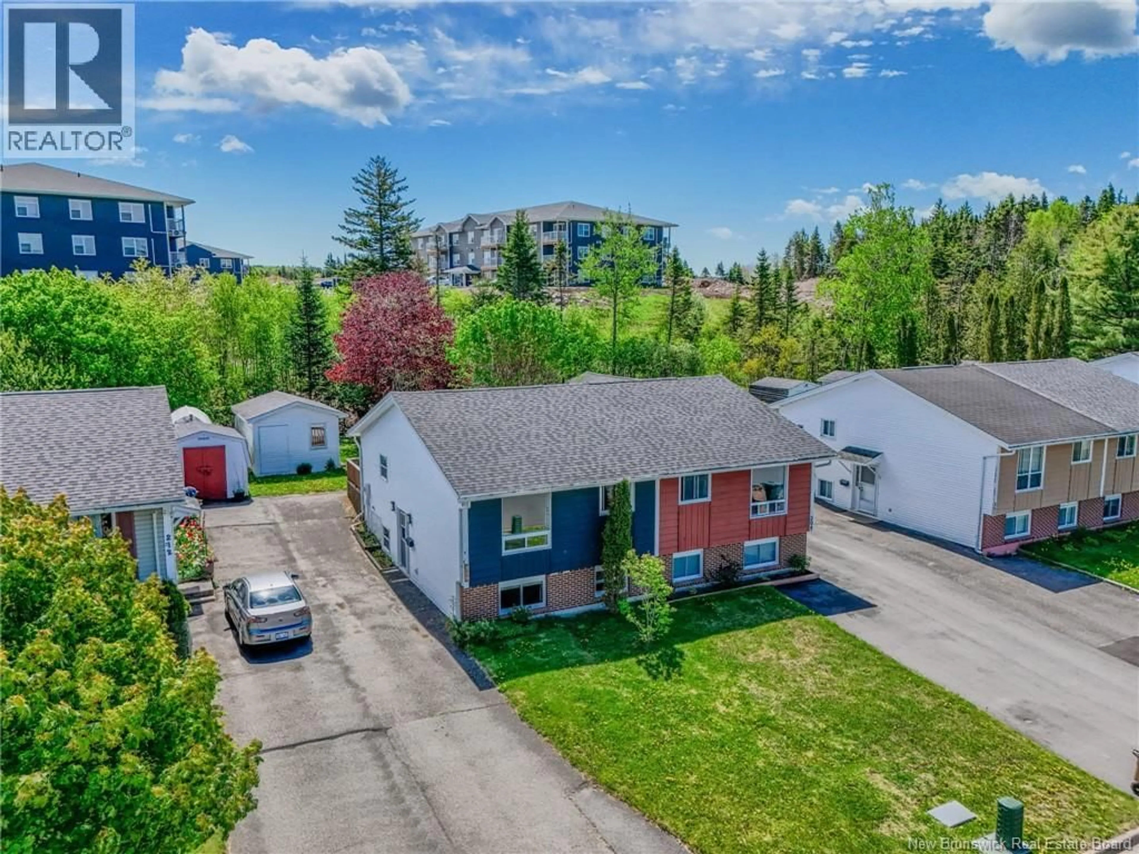 A pic from outside/outdoor area/front of a property/back of a property/a pic from drone, street for 208 BOYANER CRESCENT, Saint John New Brunswick E2J4C4